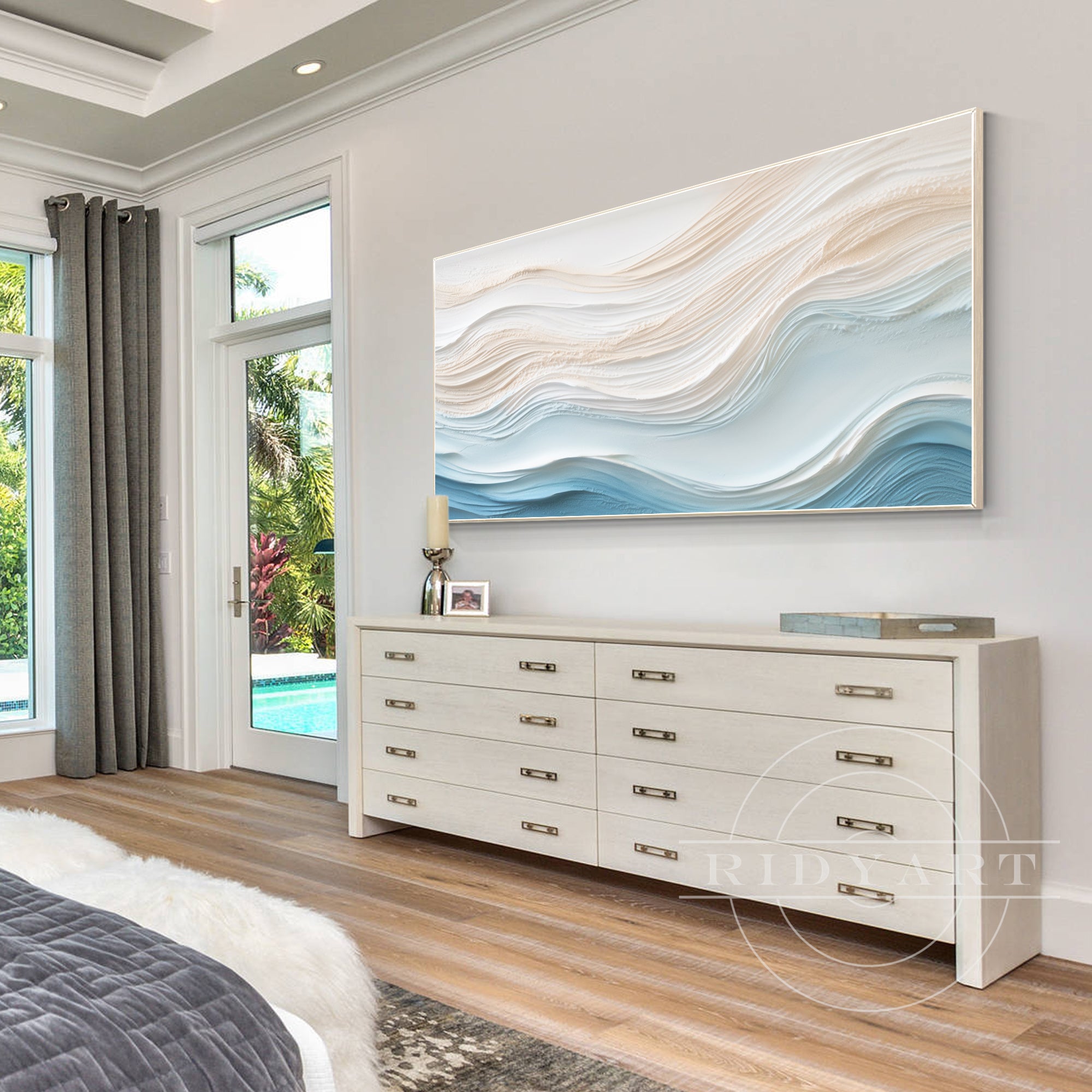 Abstract ocean wave painting in soft blue and beige, with 3D textures and a minimalist design, capturing the flow of waves in a cream-toned style.