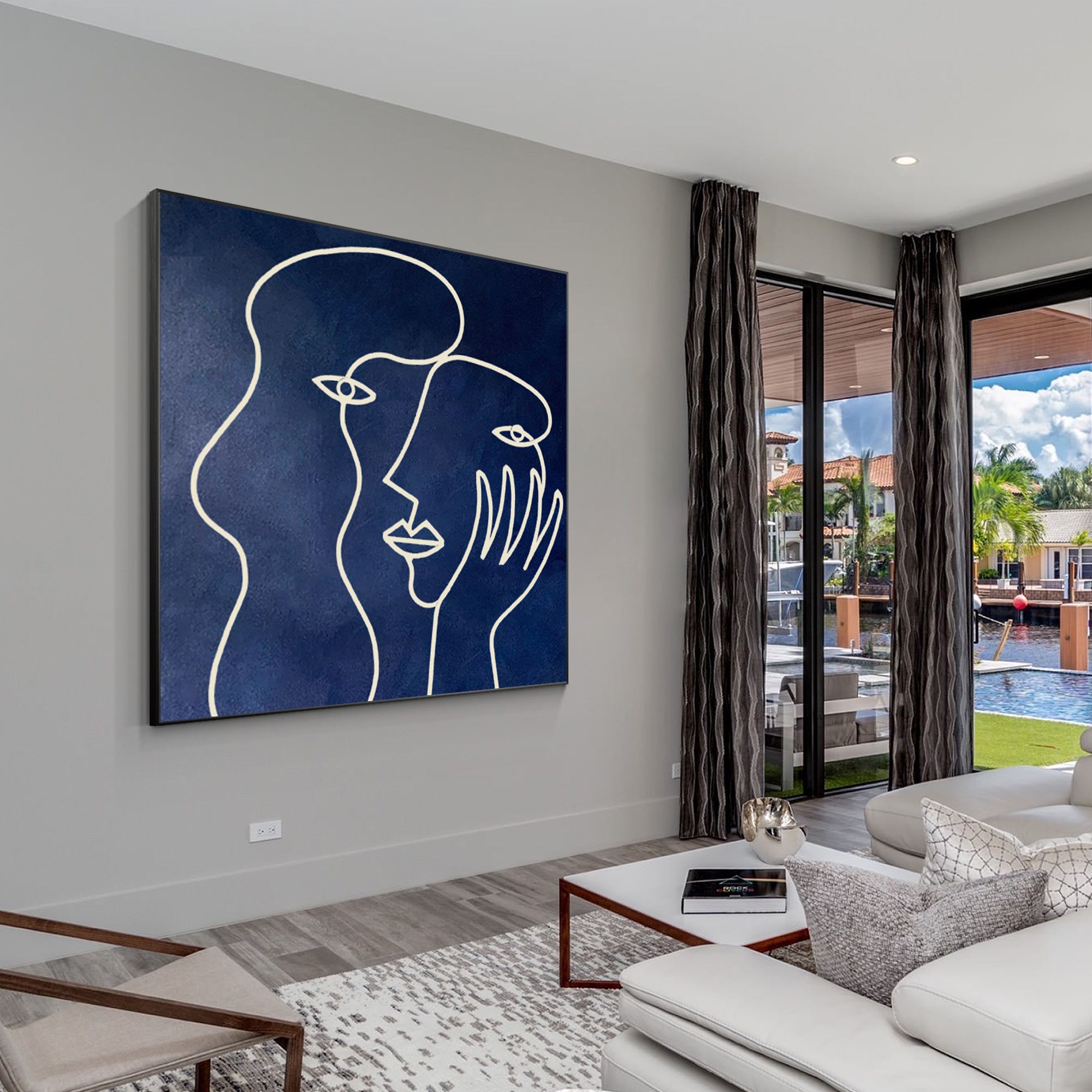 Navy blue Picasso-inspired one-line art on canvas, minimalist painting for modern wall decor in living rooms or contemporary interiors.