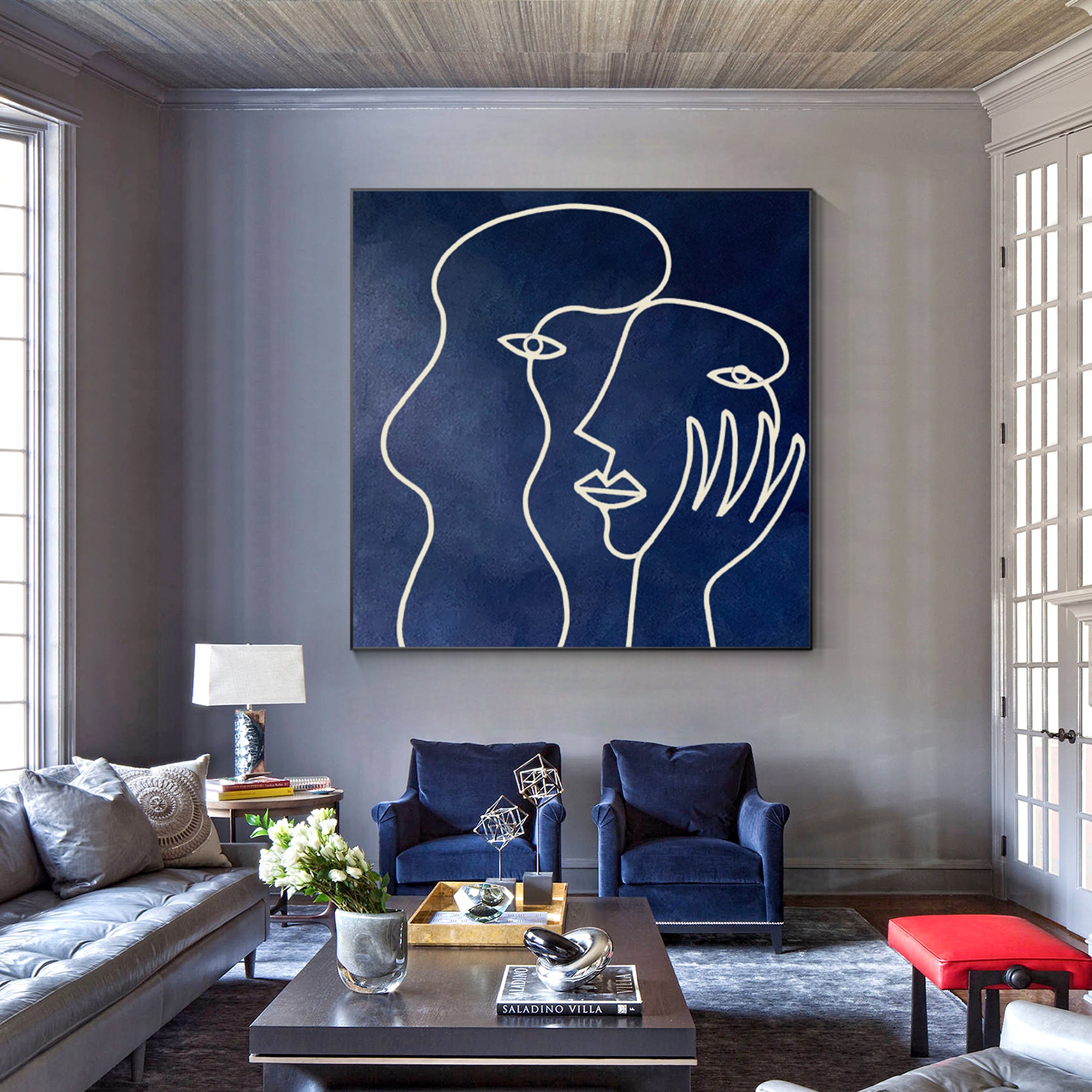 Navy blue Picasso-inspired one-line art on canvas, minimalist painting for modern wall decor in living rooms or contemporary interiors.