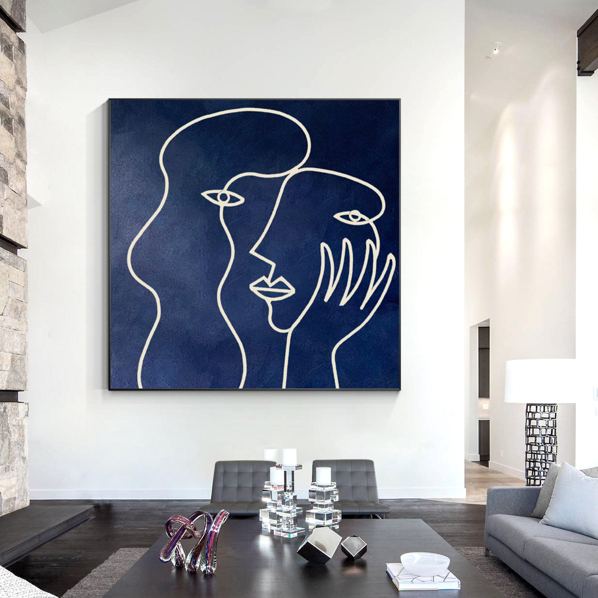 Navy blue Picasso-inspired one-line art on canvas, minimalist painting for modern wall decor in living rooms or contemporary interiors.