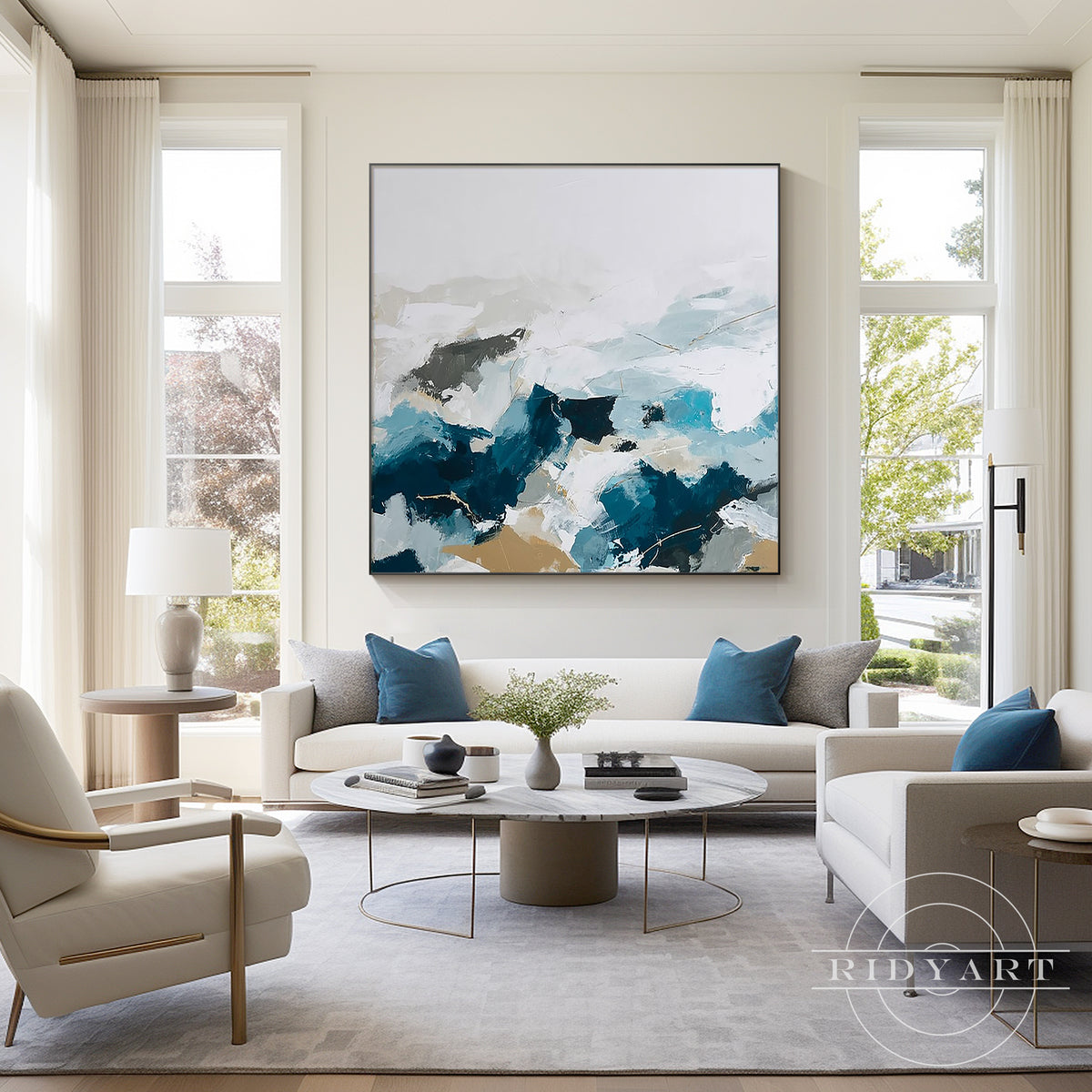Large deep blue and cream palette knife abstract canvas wall art displayed above a light wood sideboard in a contemporary living room setup.