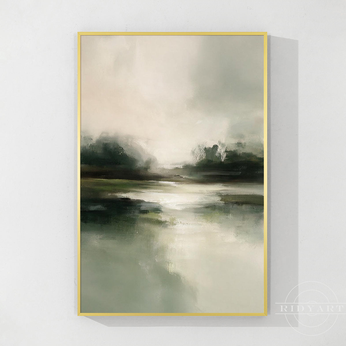 Muted green abstract landscape wall art in a slim gold frame on a white wall