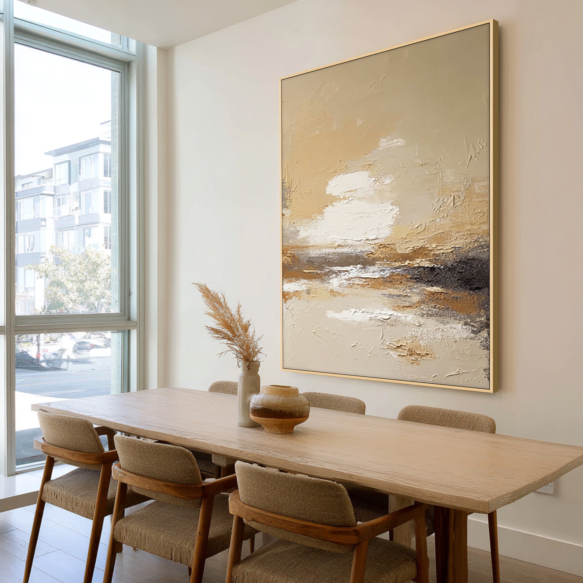 modern abstract painting above desk in home office workspace