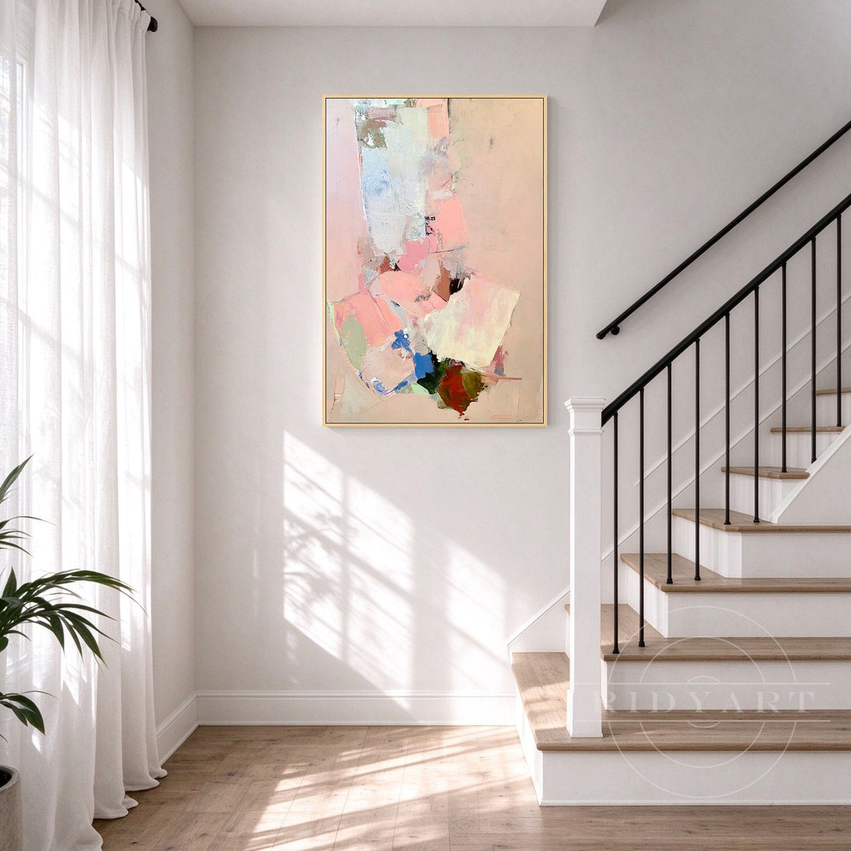 Close-up of heavy palette knife impasto texture in soft pastel pink and beige on large abstract wall decor.