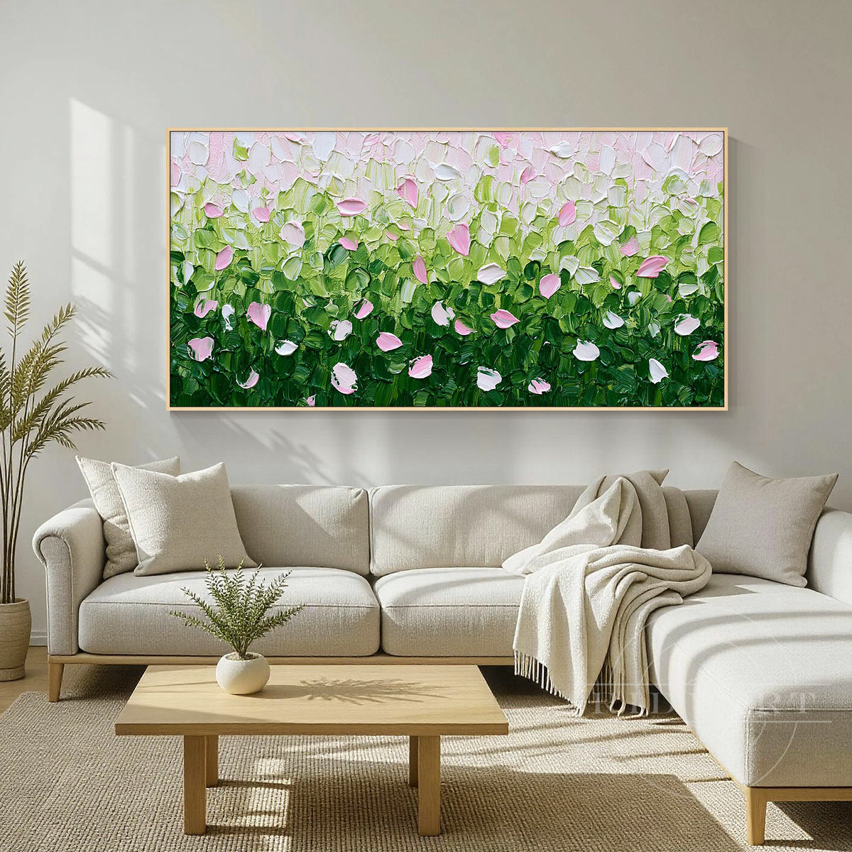 Modern textured floral canvas in green, pink and white with layered brushwork, styled in a bright neutral living room.