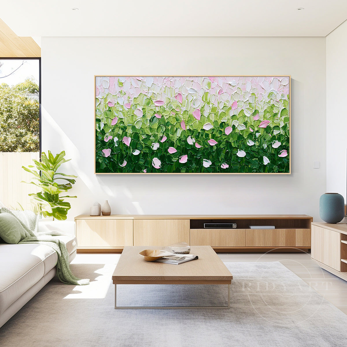 Green and pink textured floral wall art with lush foliage and impasto brushstrokes displayed as a modern living room focal point.