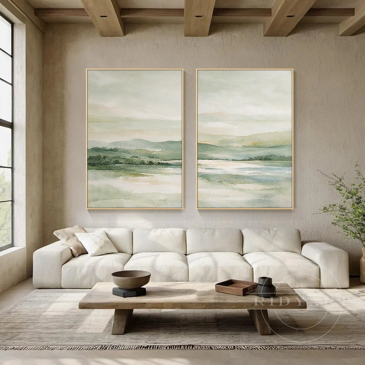 Neutral sage green landscape diptych with distant mountains and calm water, creating serene nature-inspired living room decor.