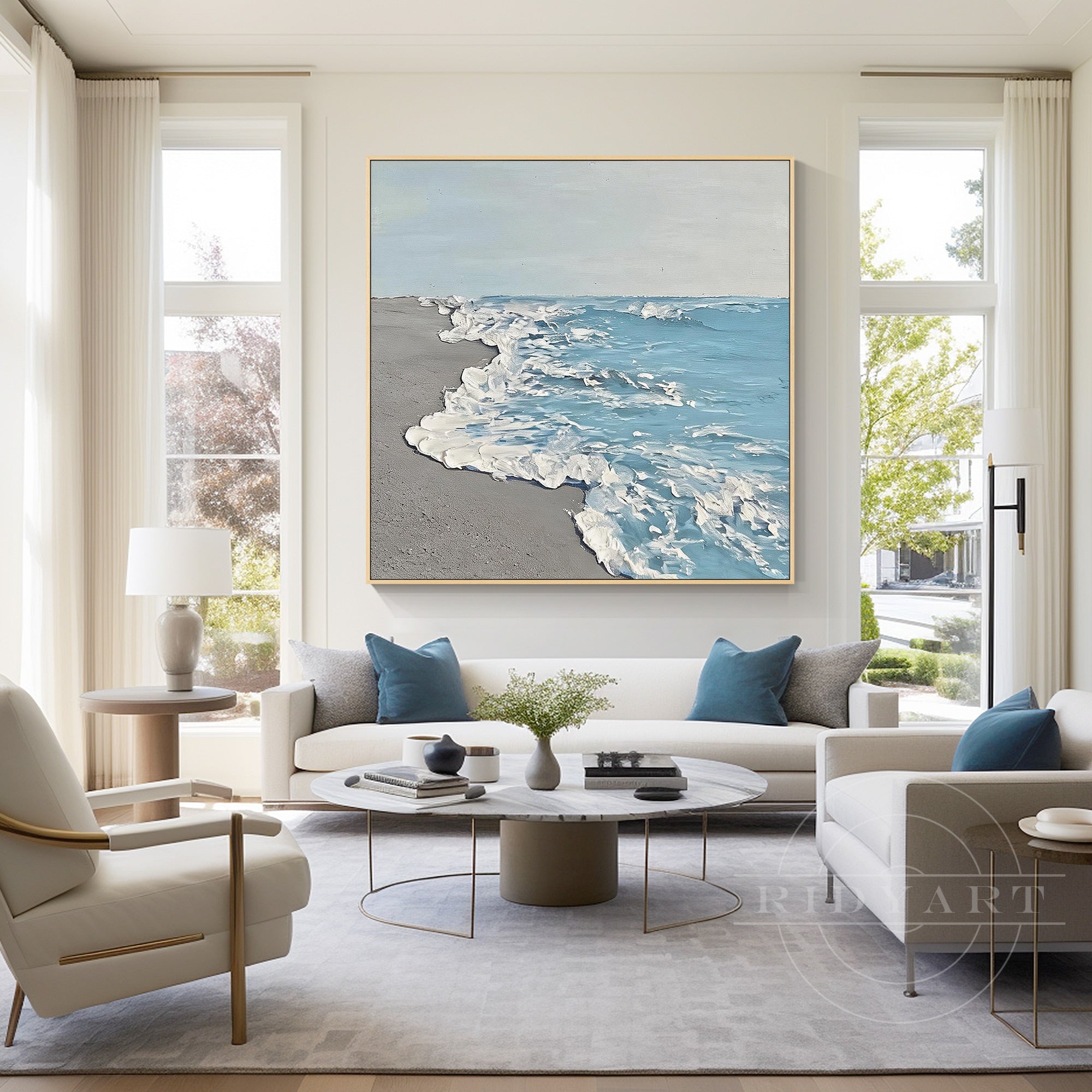 Coastal wave wall art above living room sofa