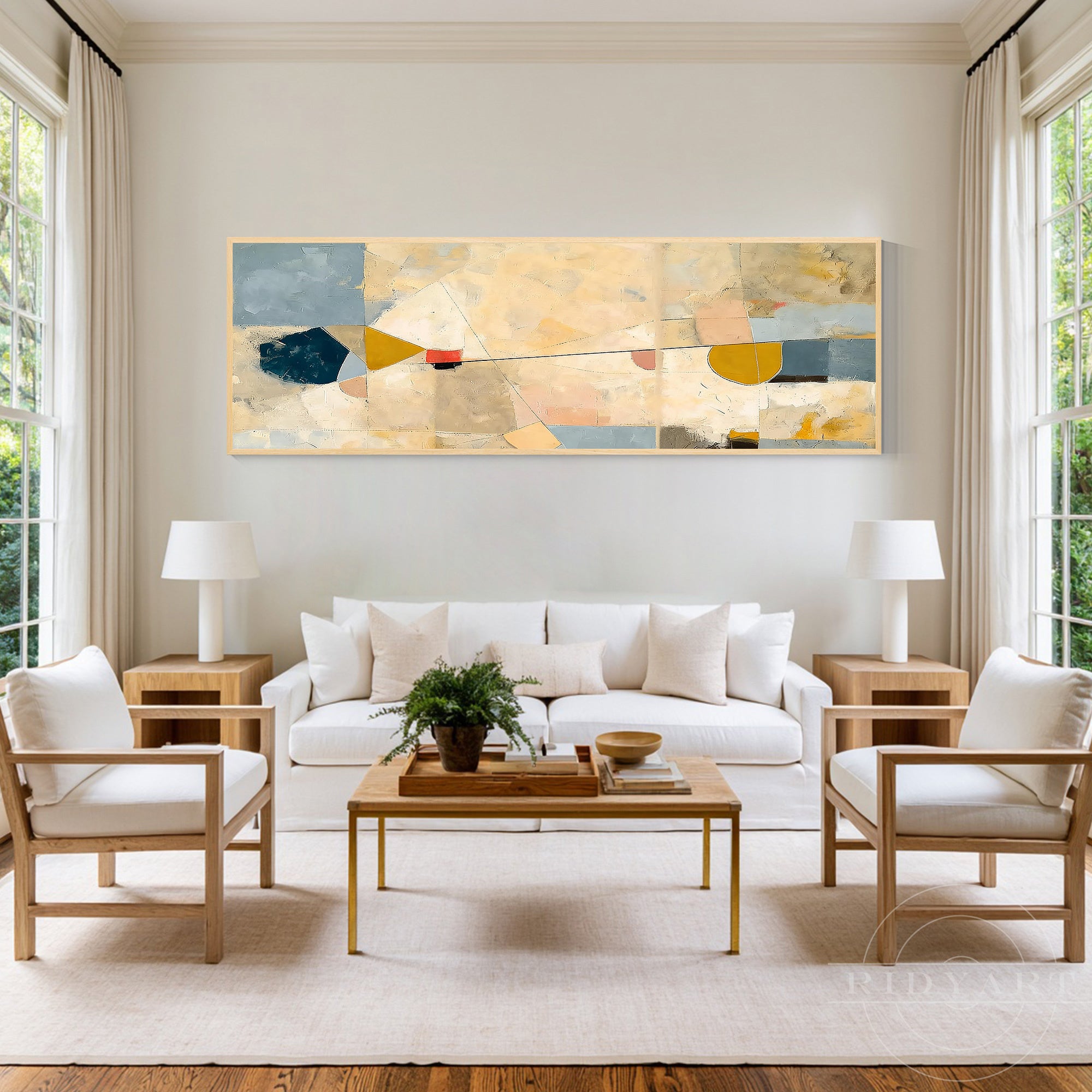 Extra-large horizontal mid-century abstract canvas art hanging above a beige sofa in a modern organic living room.