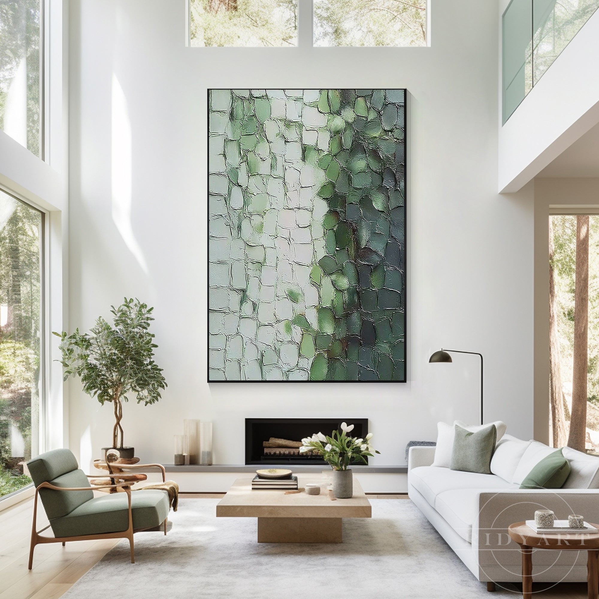 Large vertical green abstract canvas painting mounted in a double-height high-ceiling modern living room above a fireplace.