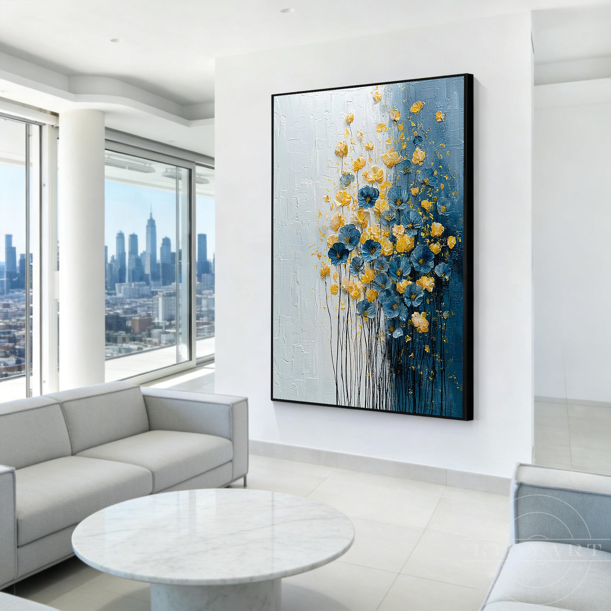 Oversized 3D impasto flower painting with blue and gold petals displayed on a white wall in a luxurious high-rise city apartment living room.