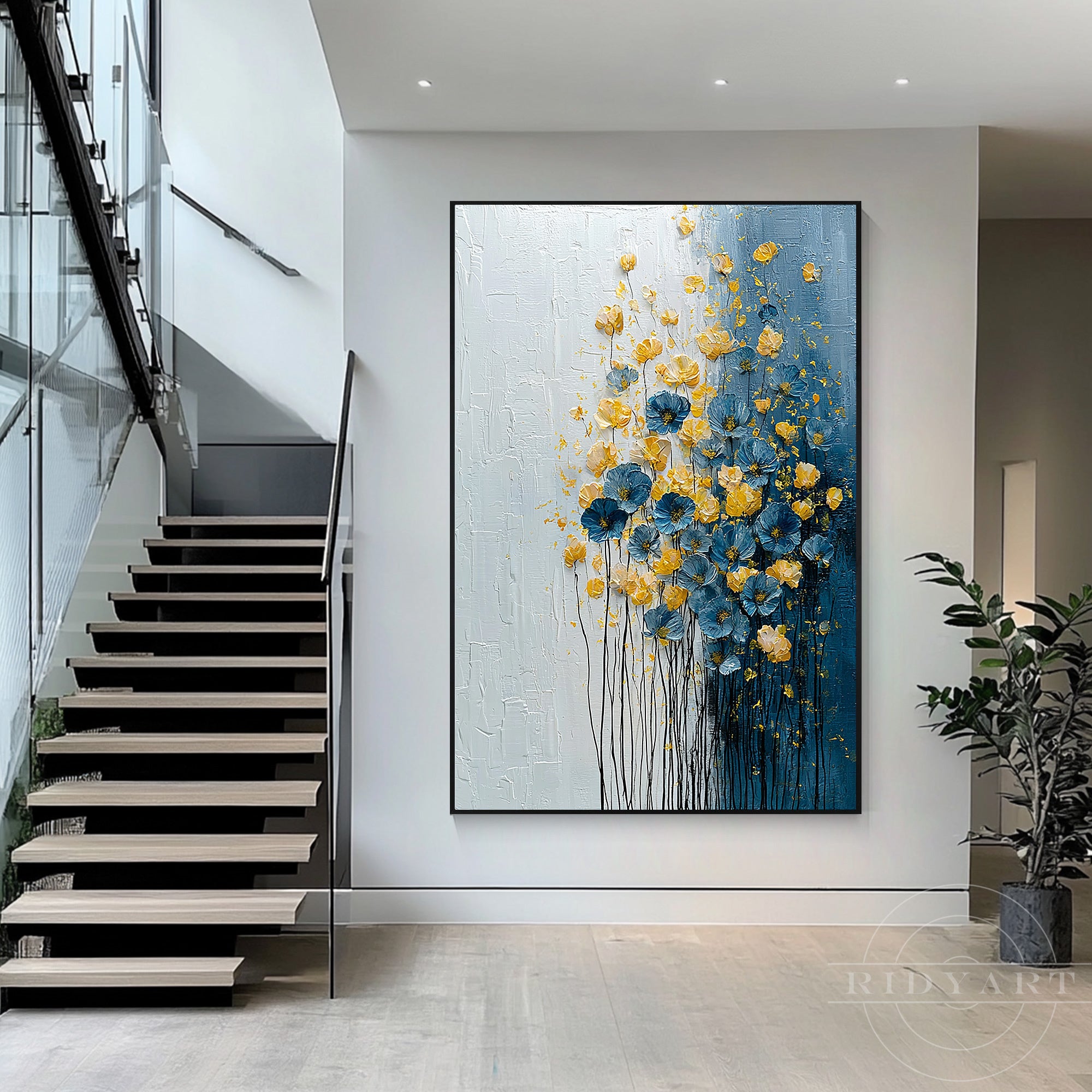 Large framed 3D textured floral painting mounted on a white entryway wall next to a modern architectural floating staircase.