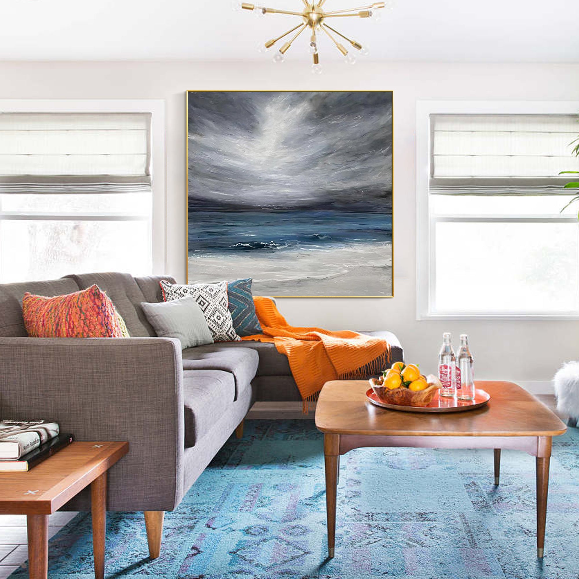 Abstract blue and gray beach wall art with textured ocean painting