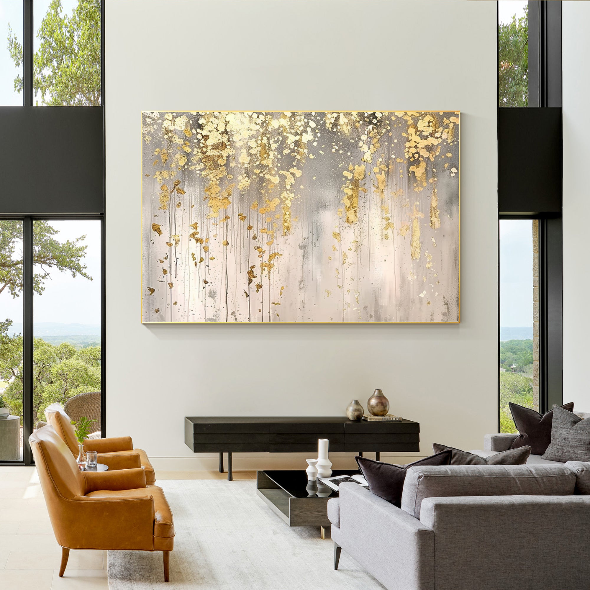 Gold leaf wall art featuring abstract flower designs.