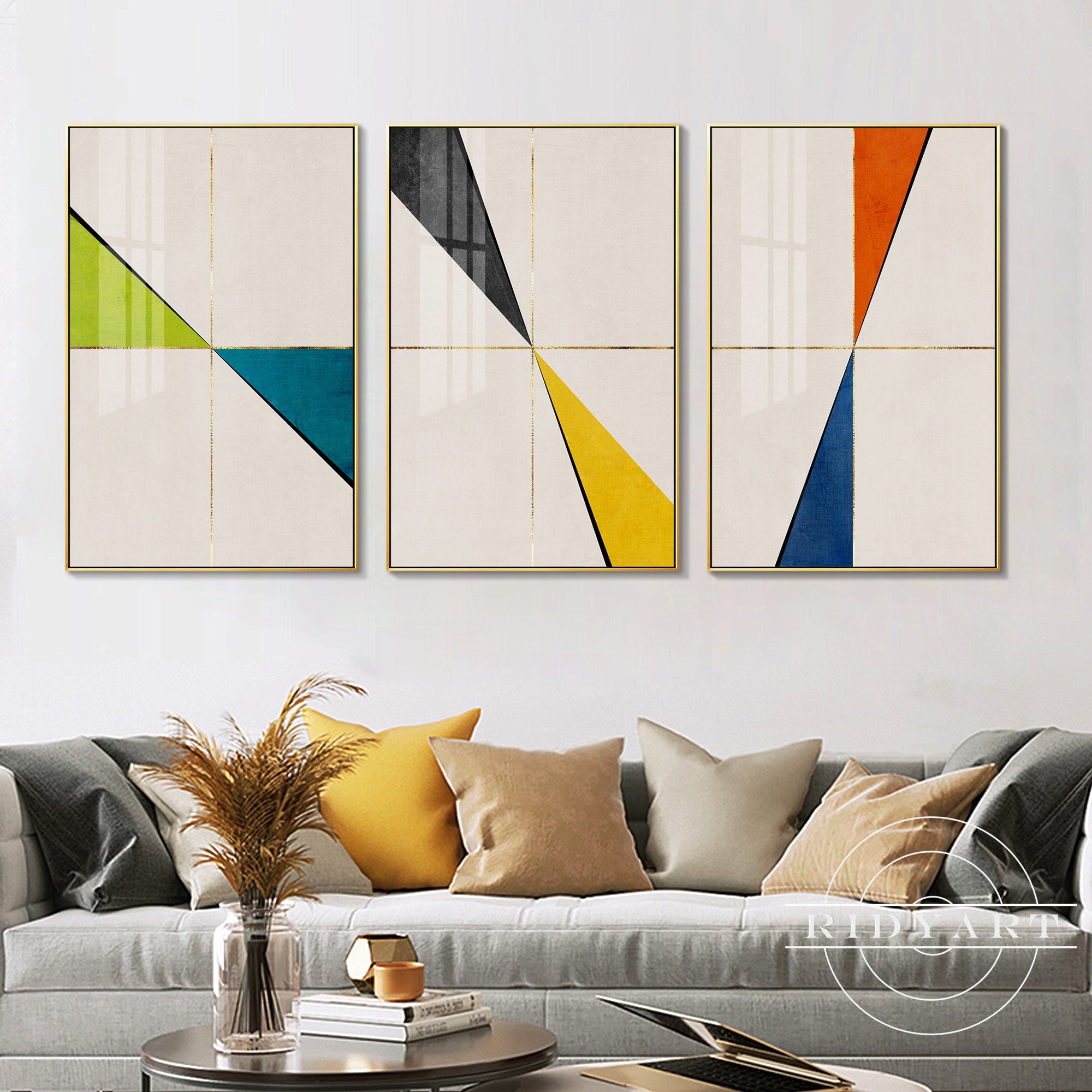 Modern geometric wall art triptych in gold tones