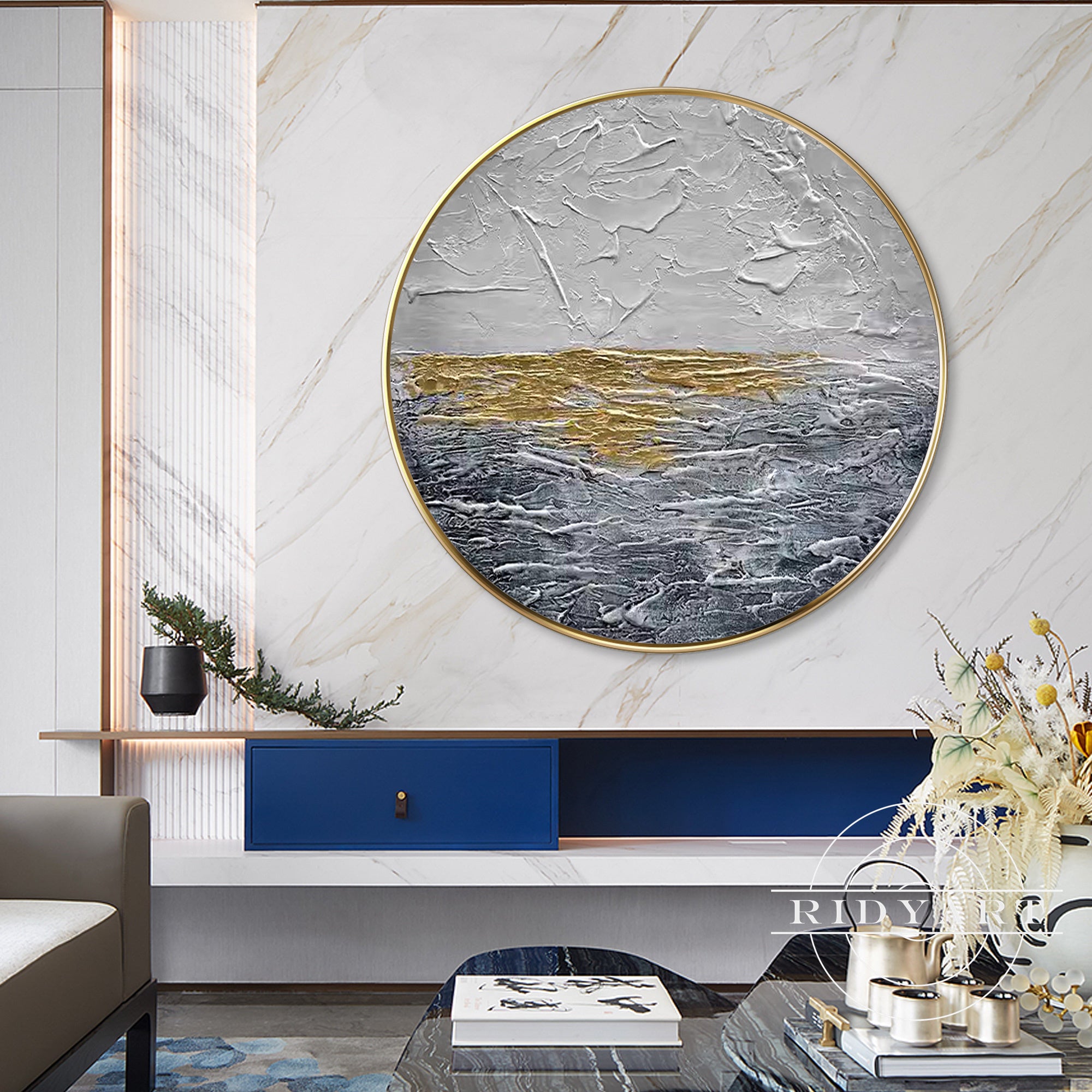 Contemporary textured painting in gold and gray.