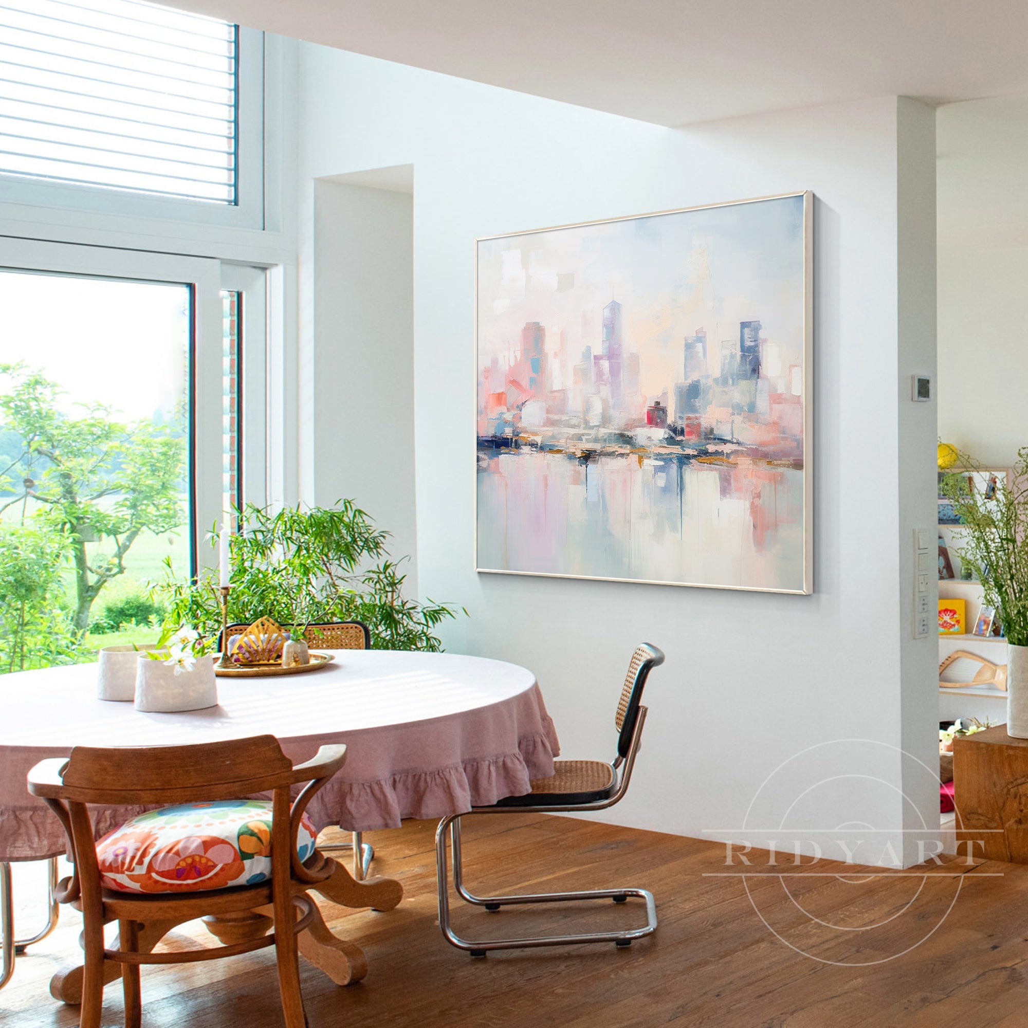Modern cityscape painting with pastel pink and blue hues for home decor.