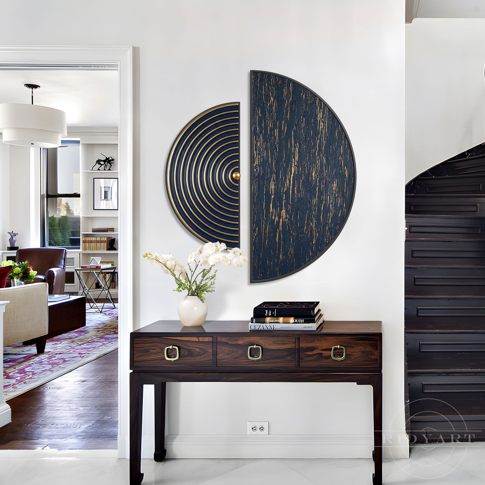 Modern luxury blue and gold 3D half-circle wall art hanging above a dark wood console table in an elegant entryway.