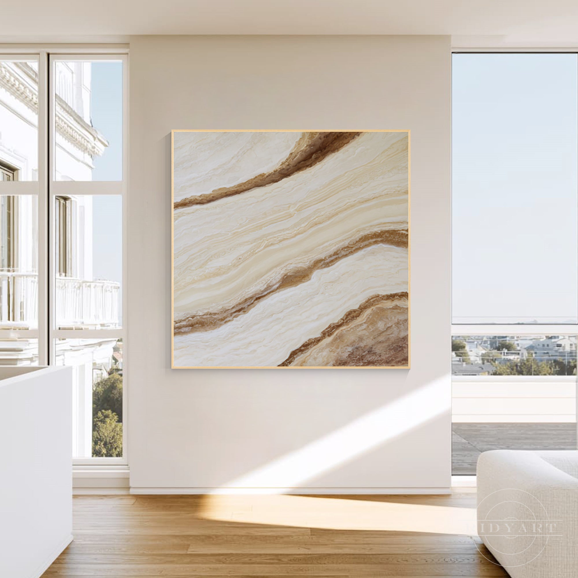 Modern framed wall art with smooth sweeping organic veins of bronze, cream, and tan mimicking polished natural marble stone.