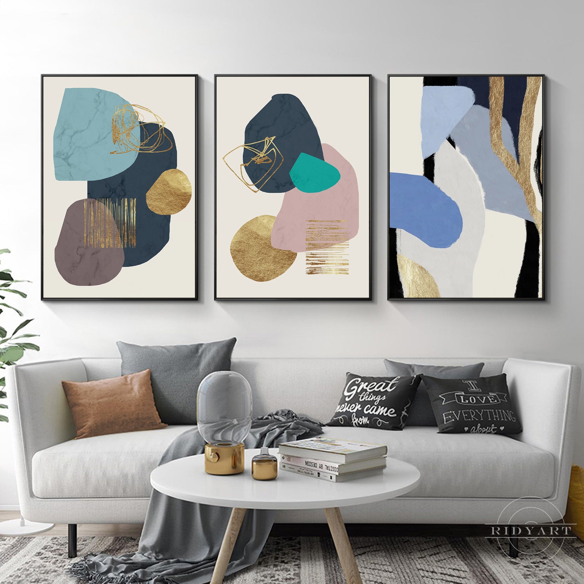 Trio of minimalist blue and gold acrylic paintings