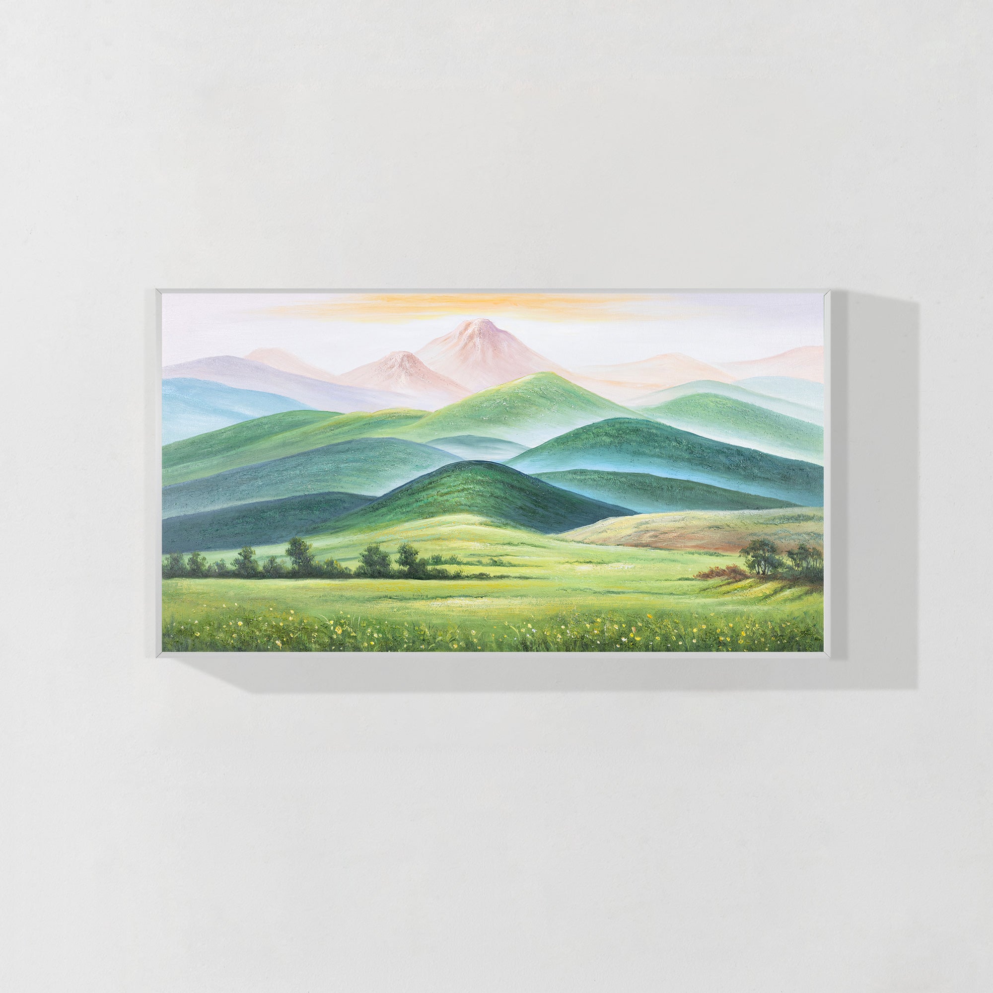 Colorful landscape wall art with green, gold, and pink