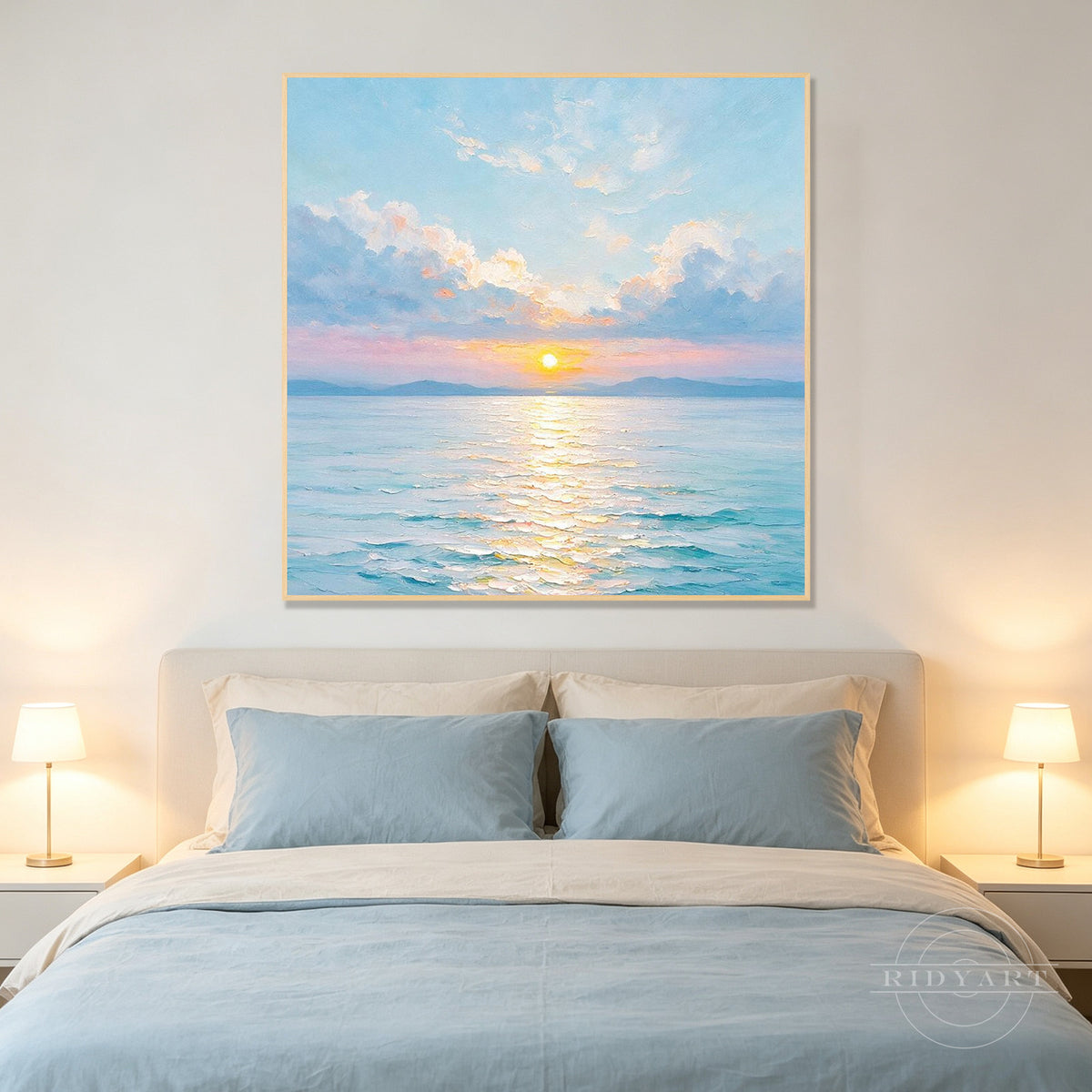 Pastel sunset ocean wall art in soft blue, pink, ivory, and golden yellow tones.