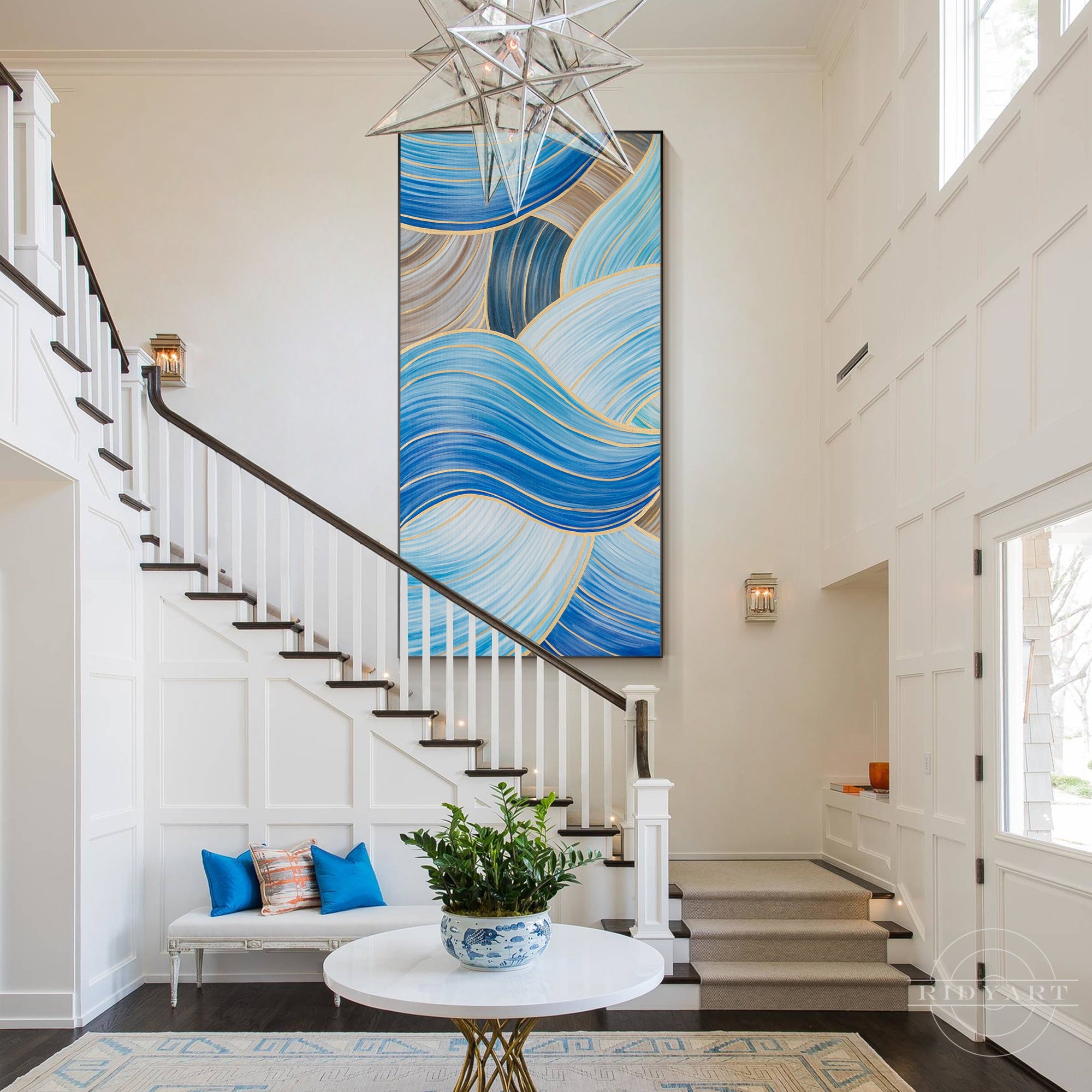 Blue and gold abstract ribbon painting on canvas.