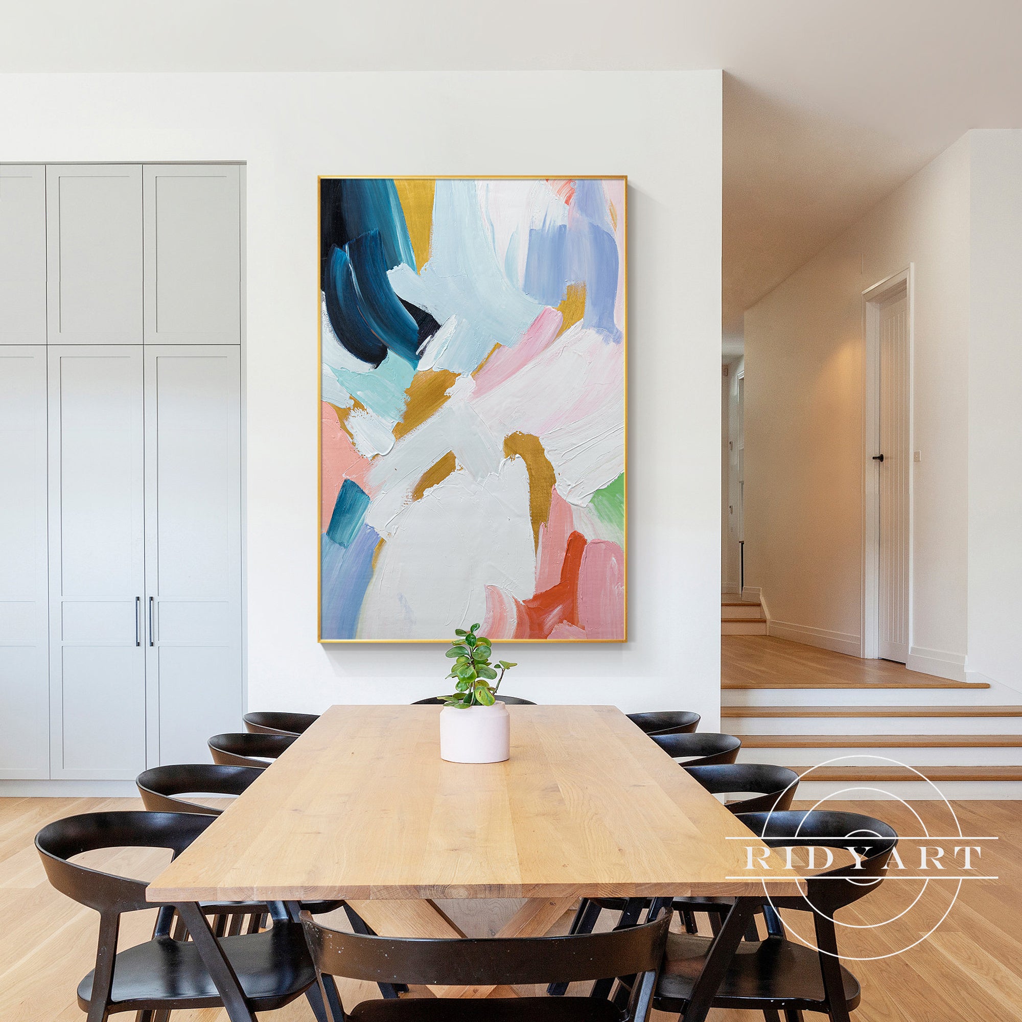 Extra-large colorful abstract wall art with blue and pink tones.