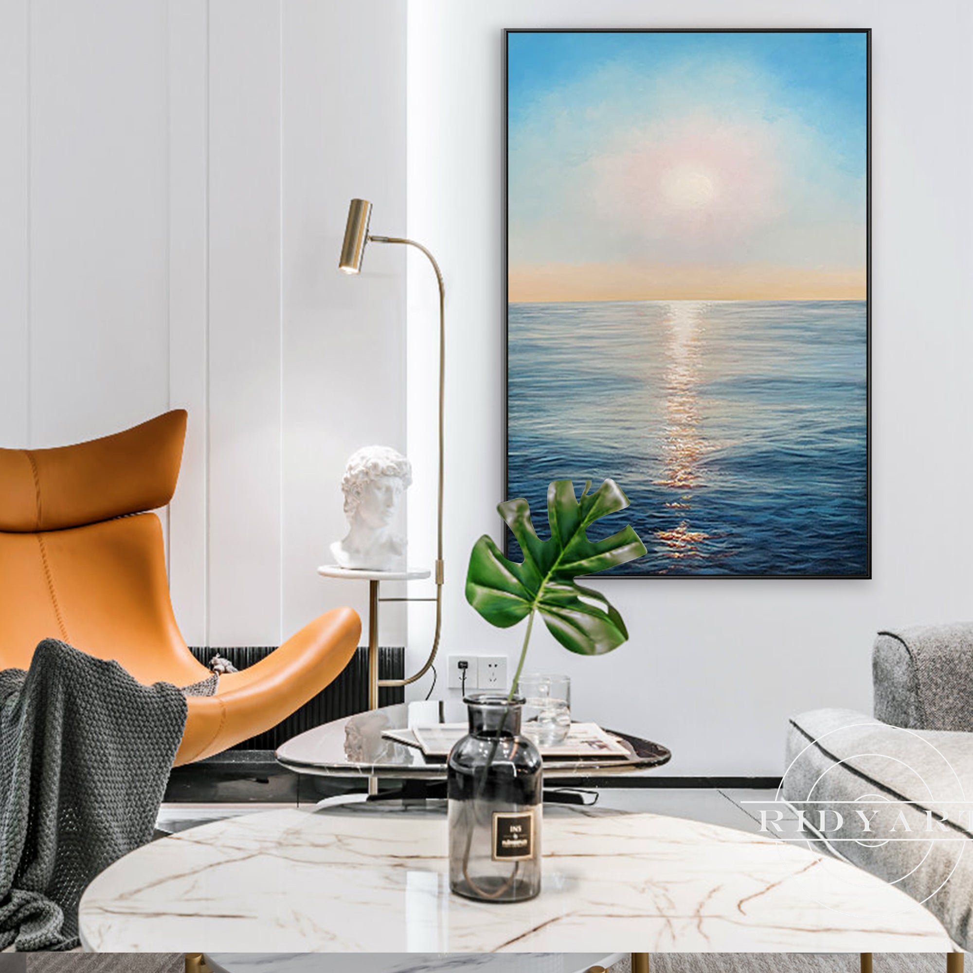 Modern coastal wall art with ocean and sunrise colors