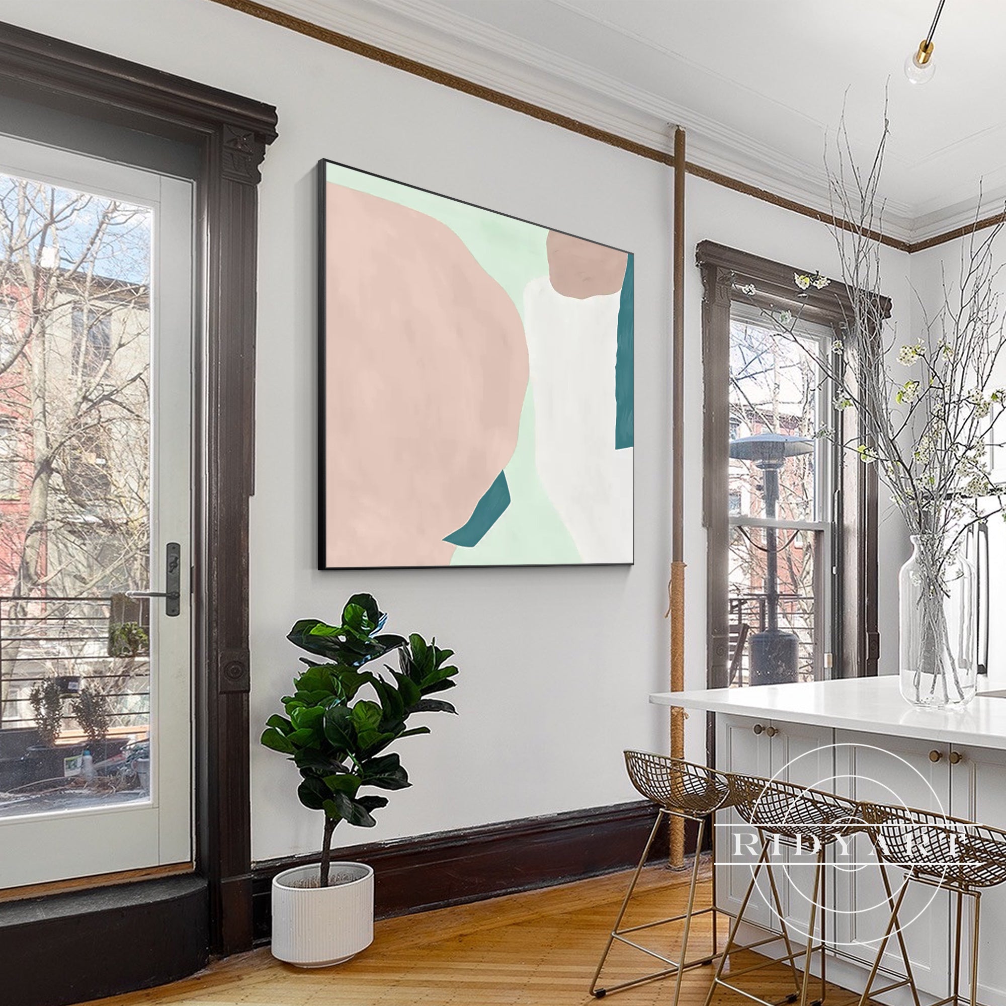 Contemporary wall art in pink, teal, and white