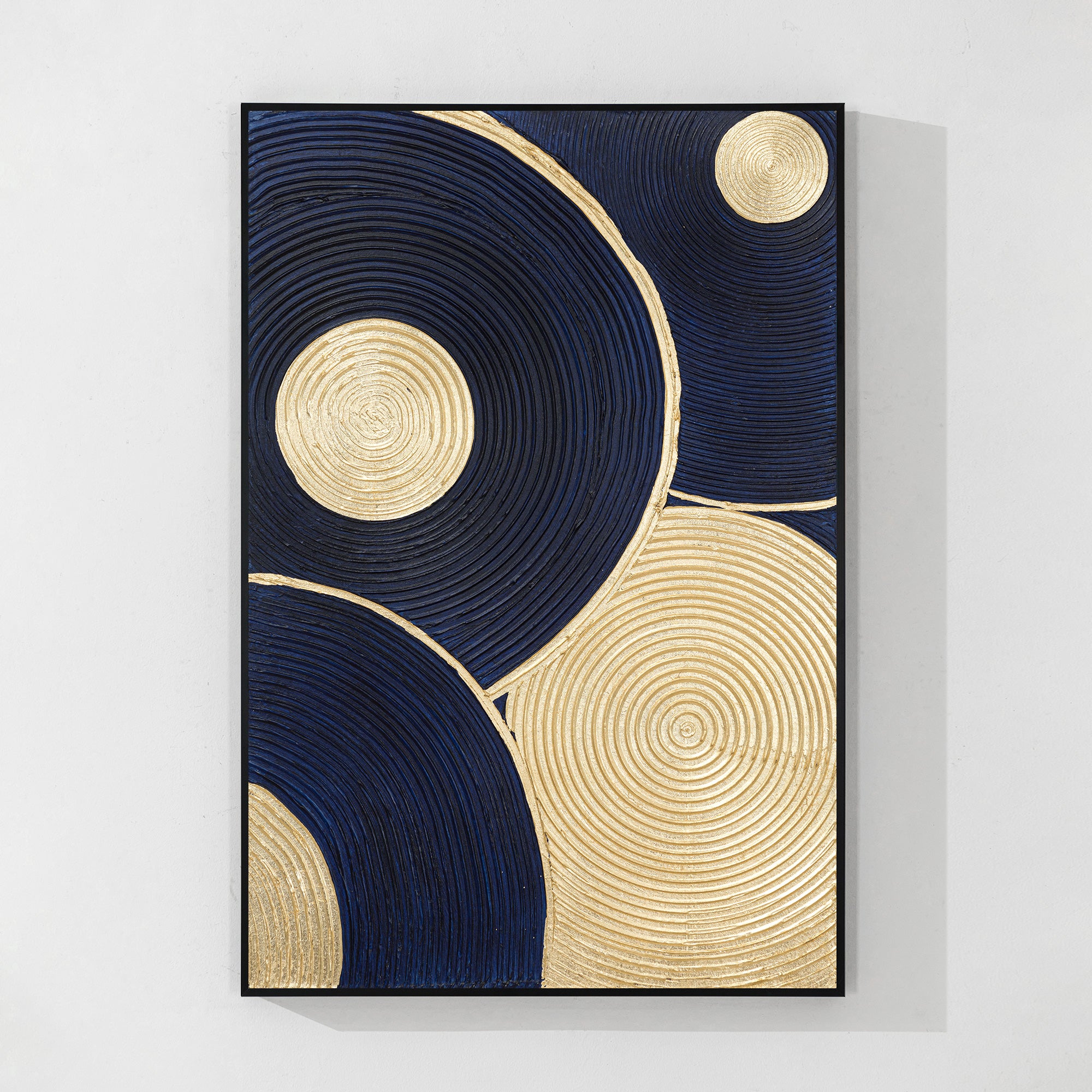 Gold foil and navy blue abstract circle textured canvas art