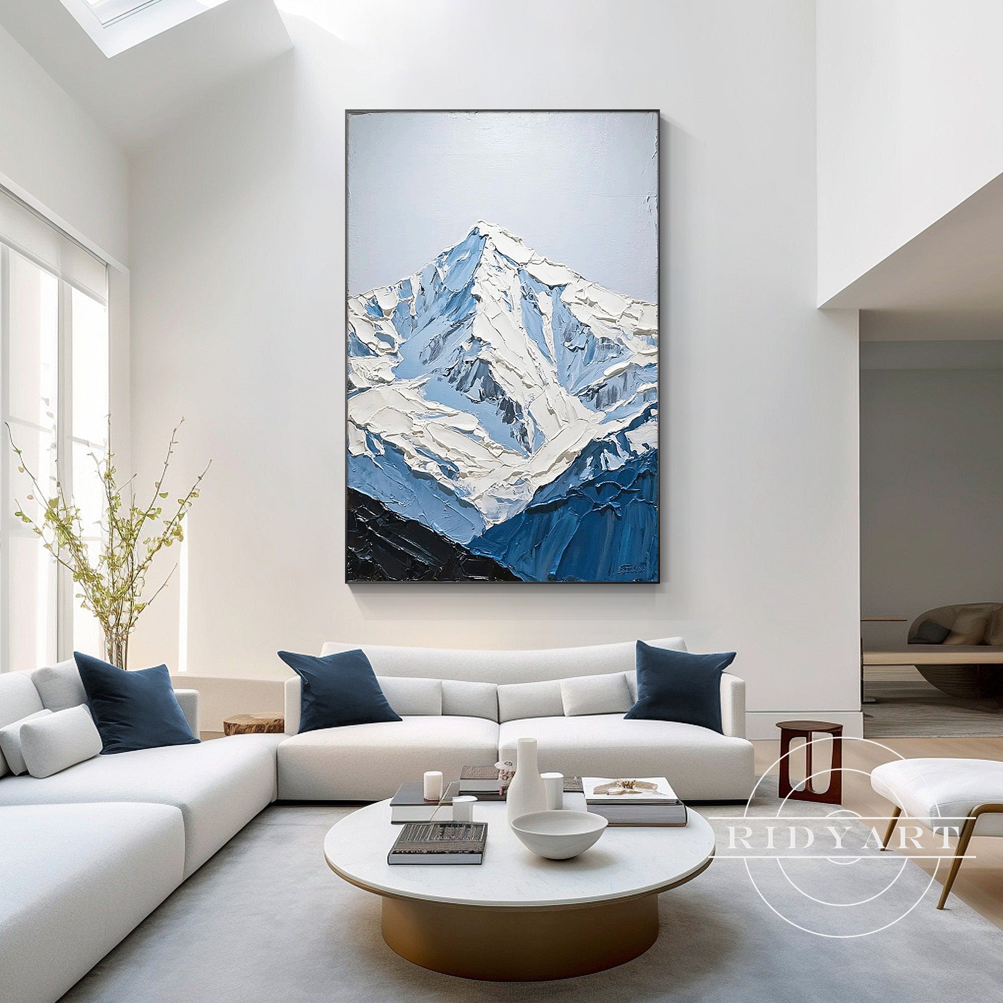 Blue and white abstract mountain artwork on canvas
