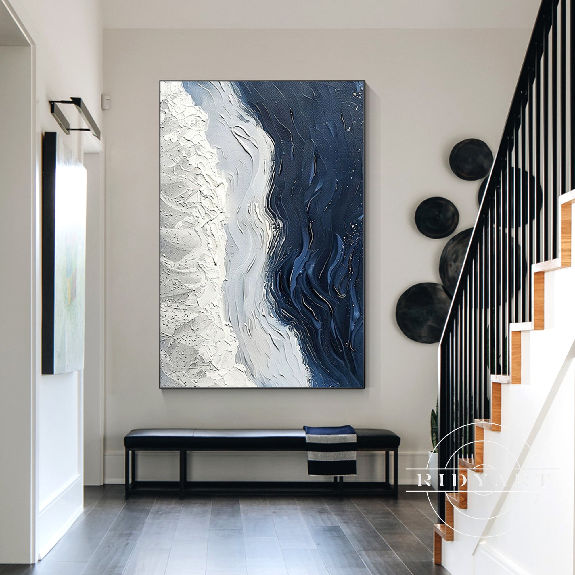 Large canvas painting featuring white beach and deep blue sea.