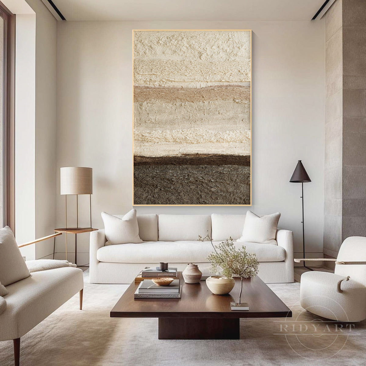 Large warm minimalist abstract painting styled above a contemporary sofa, bringing Japandi and Wabi-Sabi decor vibes to the living room.