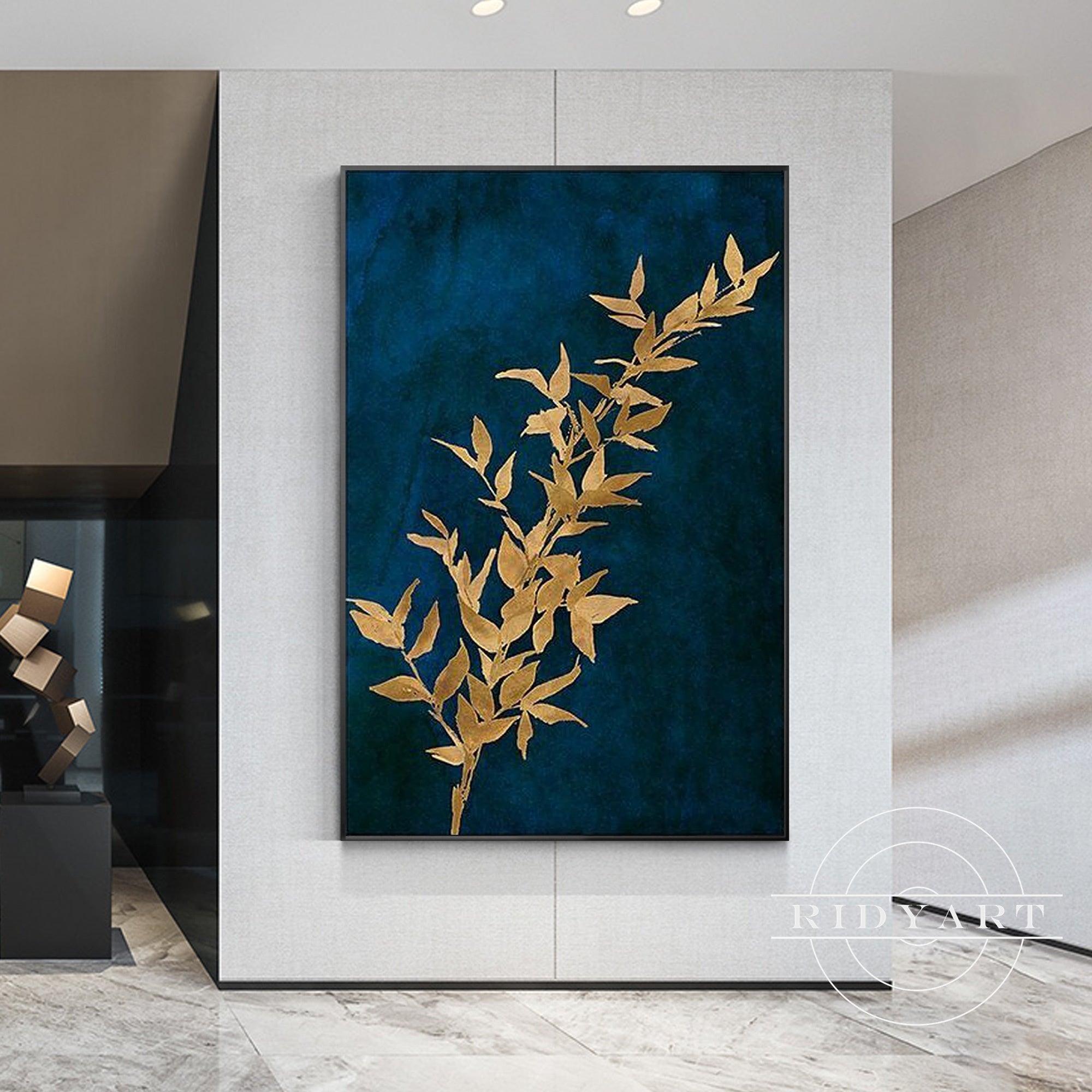 Abstract canvas artwork with gold leaf accents