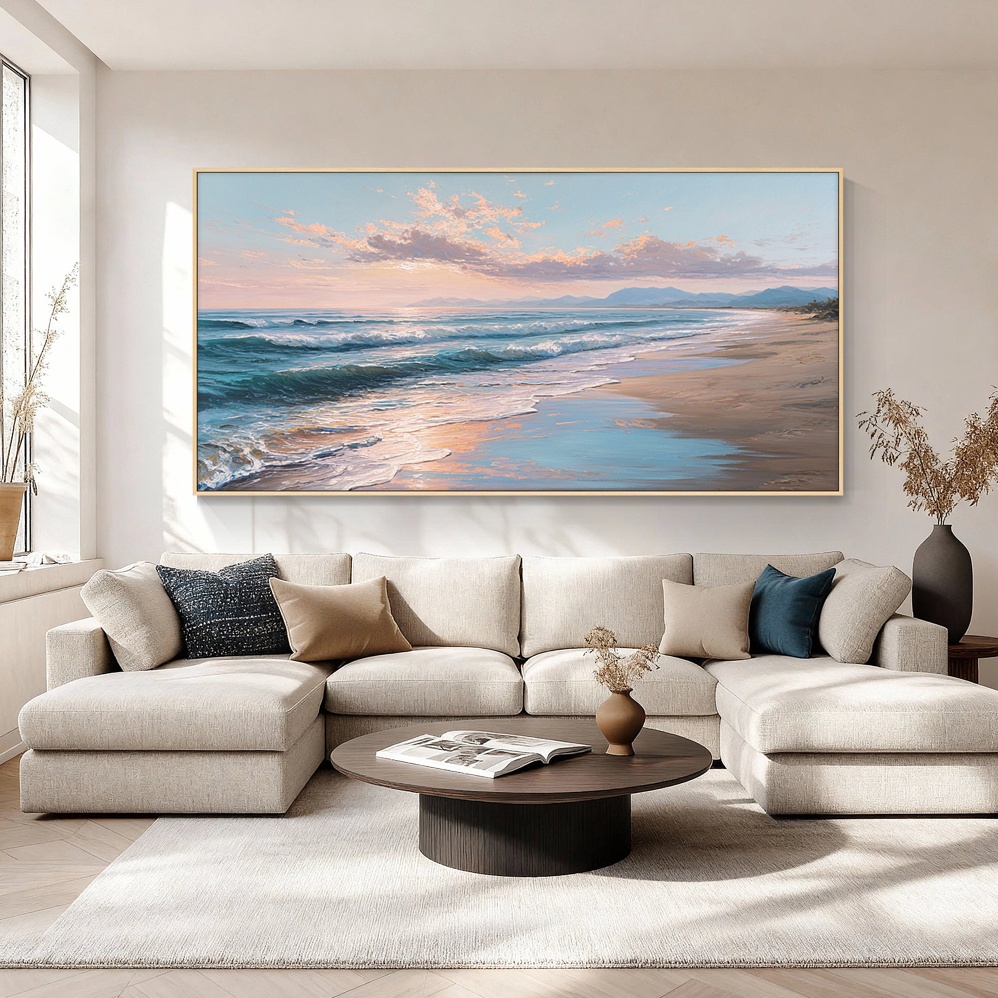 Wide beach sunset artwork in minimalist living room setting