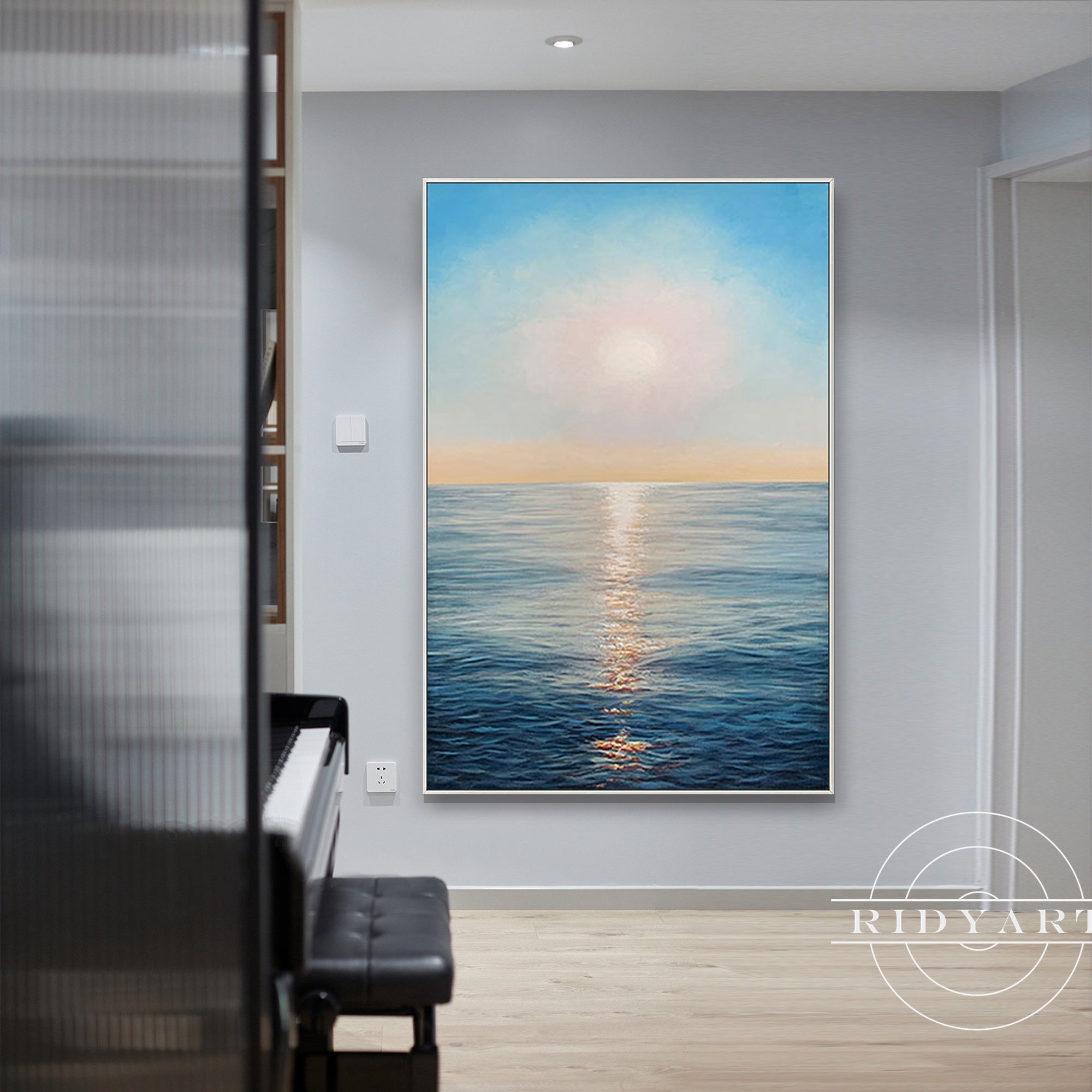 Textured abstract seascape painting in blue and gold tones