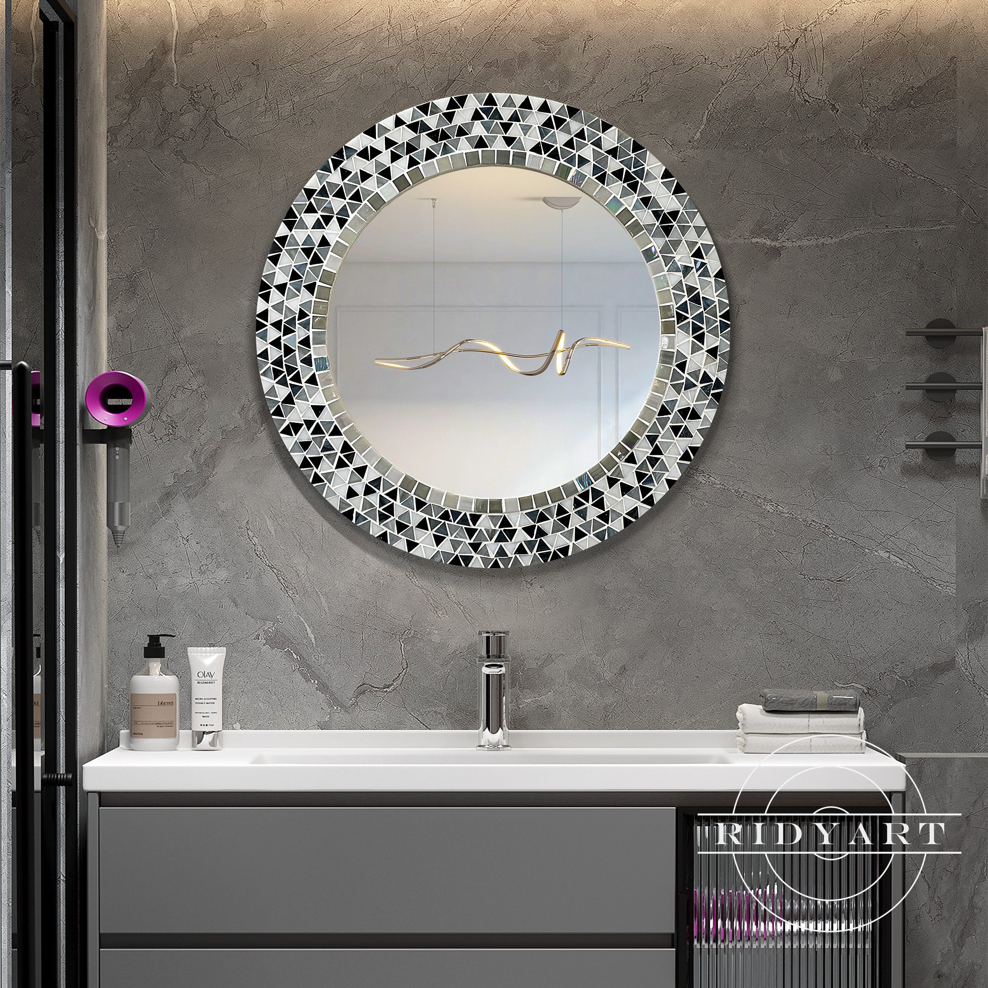 Close-up of handcrafted mosaic glass tile frame design