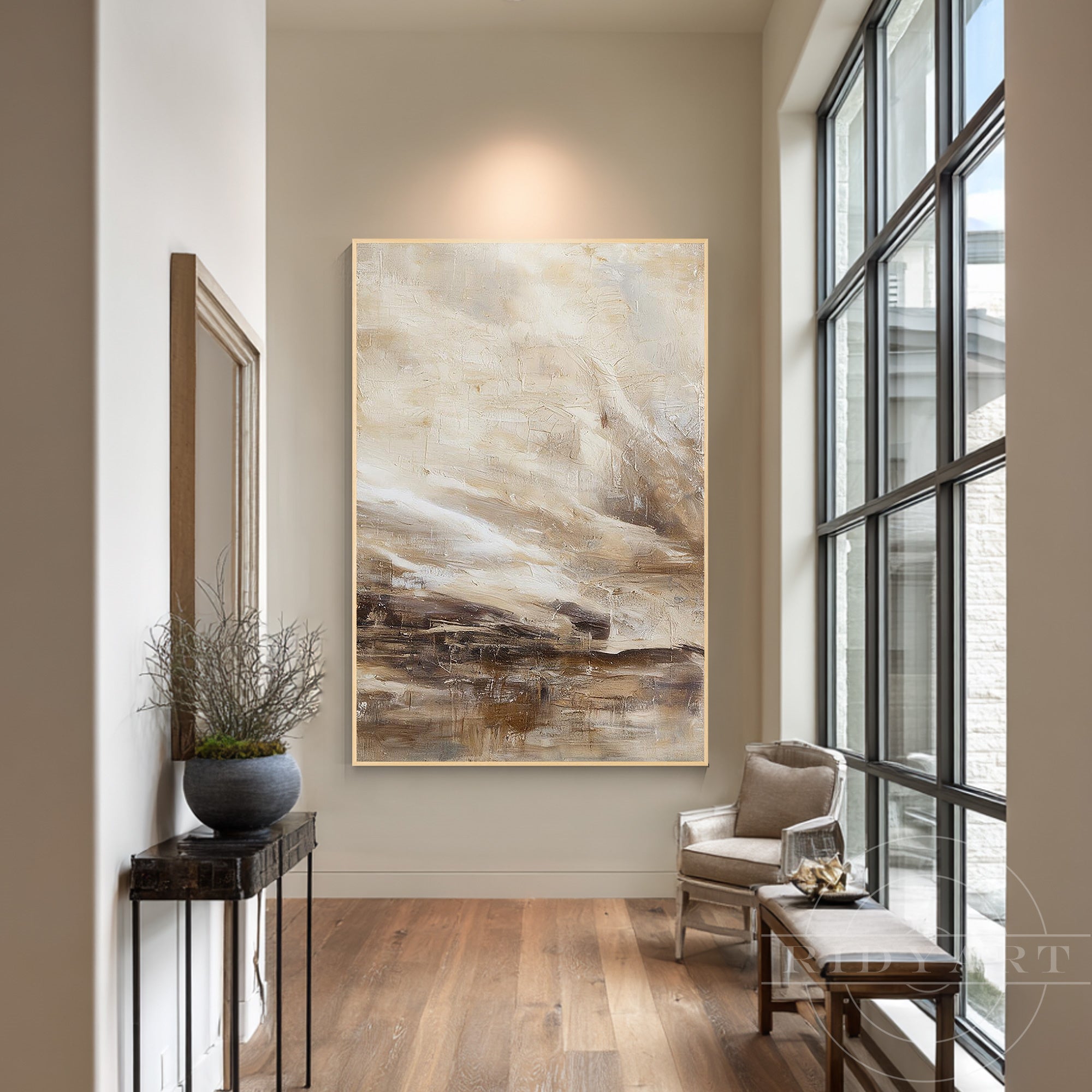 Minimalist earth tone vertical canvas wall art in warm sandy beige and rich dark brown with a light wooden frame