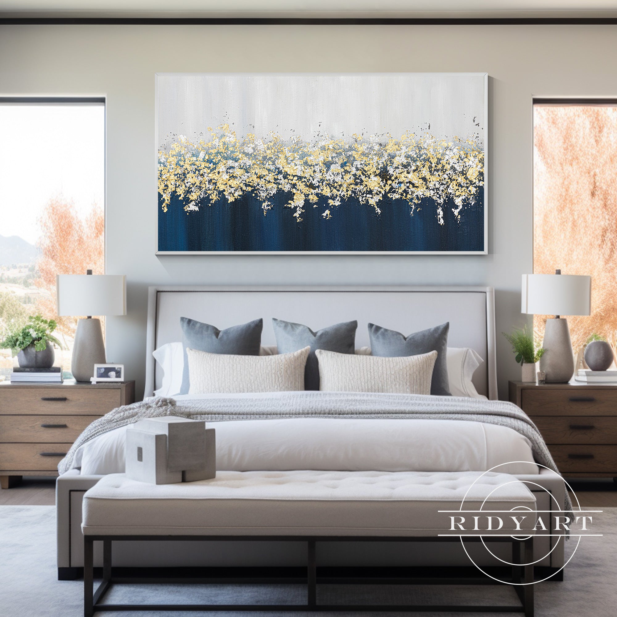 Gray and blue wall art with gold and silver leaf embellishment
