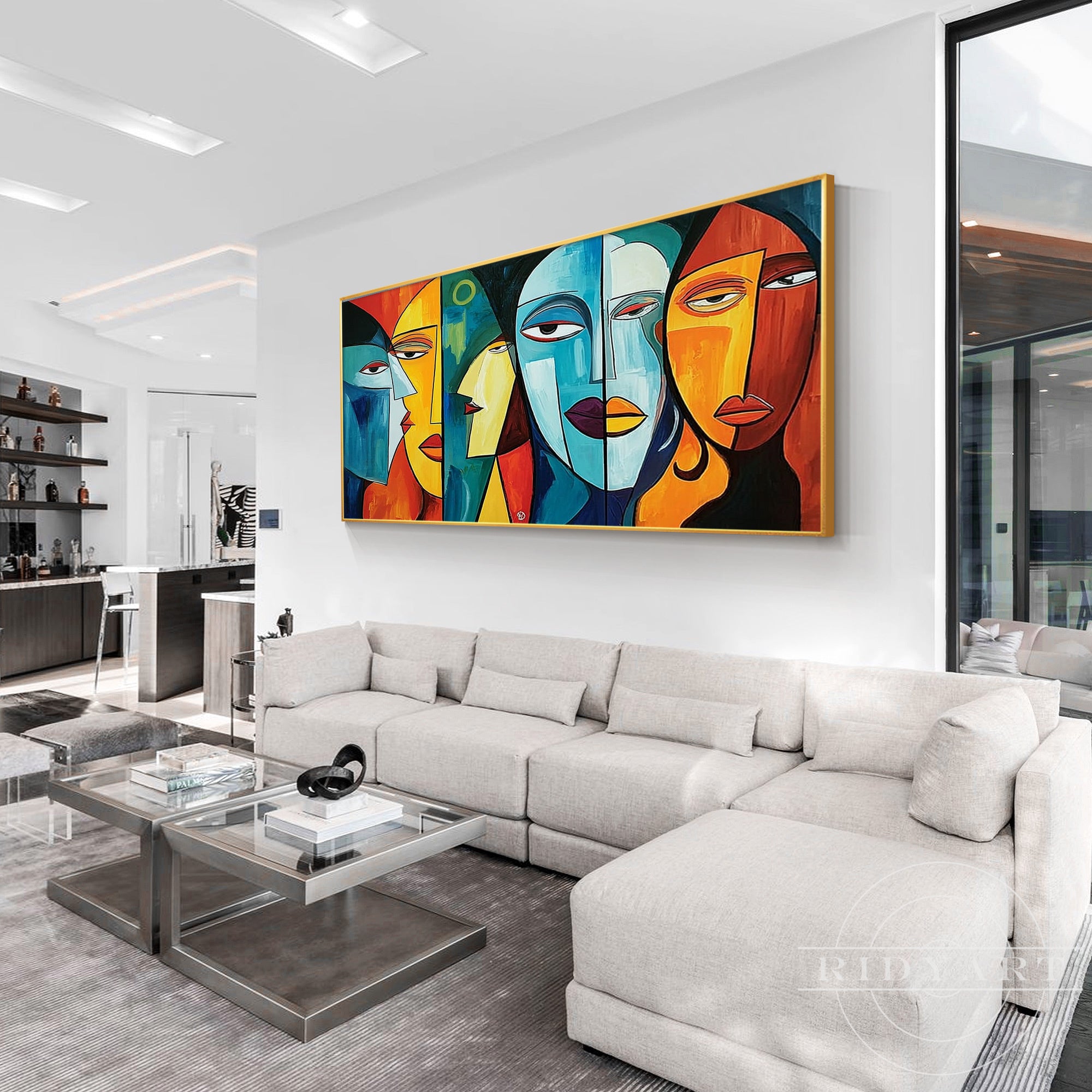 Oversized abstract portrait canvas featuring expressive geometric faces in bold contemporary colors.