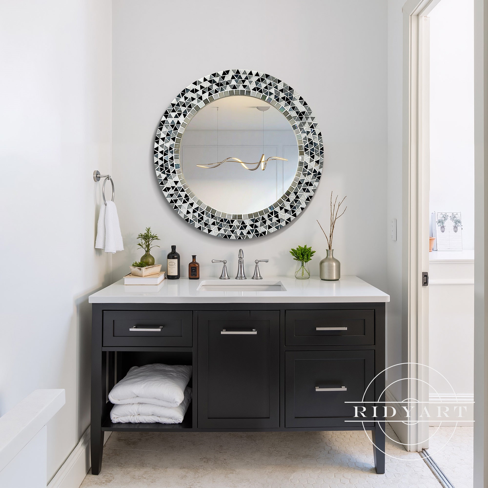 Round wall mirror with irregular mosaic tile border