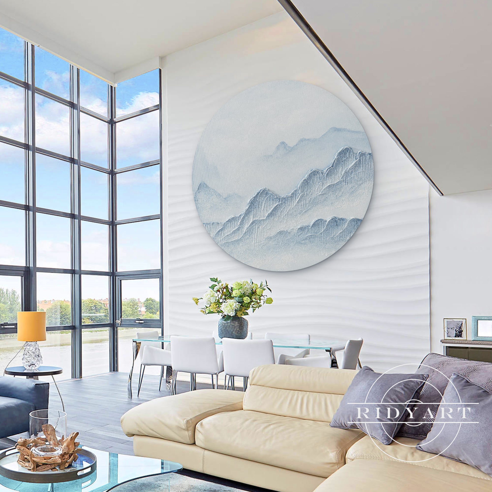Round blue and white 3D textured mountain wall art framed.