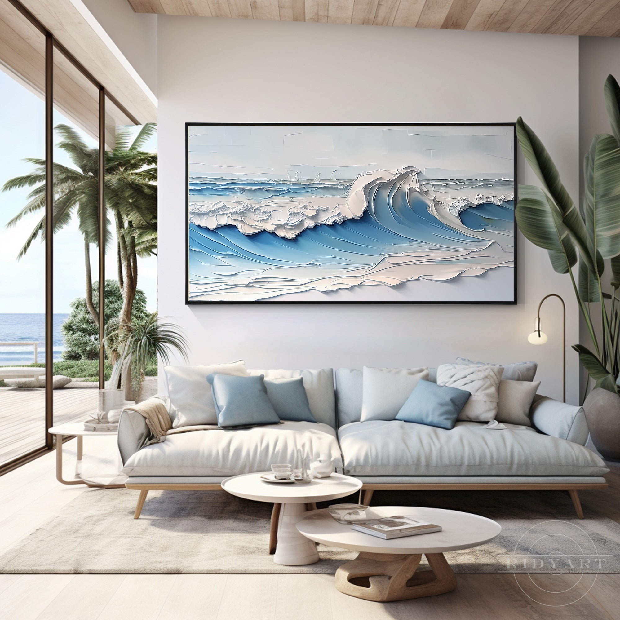 A large-scale, heavy-textured impasto canvas painting of a powerful ocean wave, with detailed white seafoam crests, displayed as a central art piece above a sofa in a modern, coastal-inspired living room.
