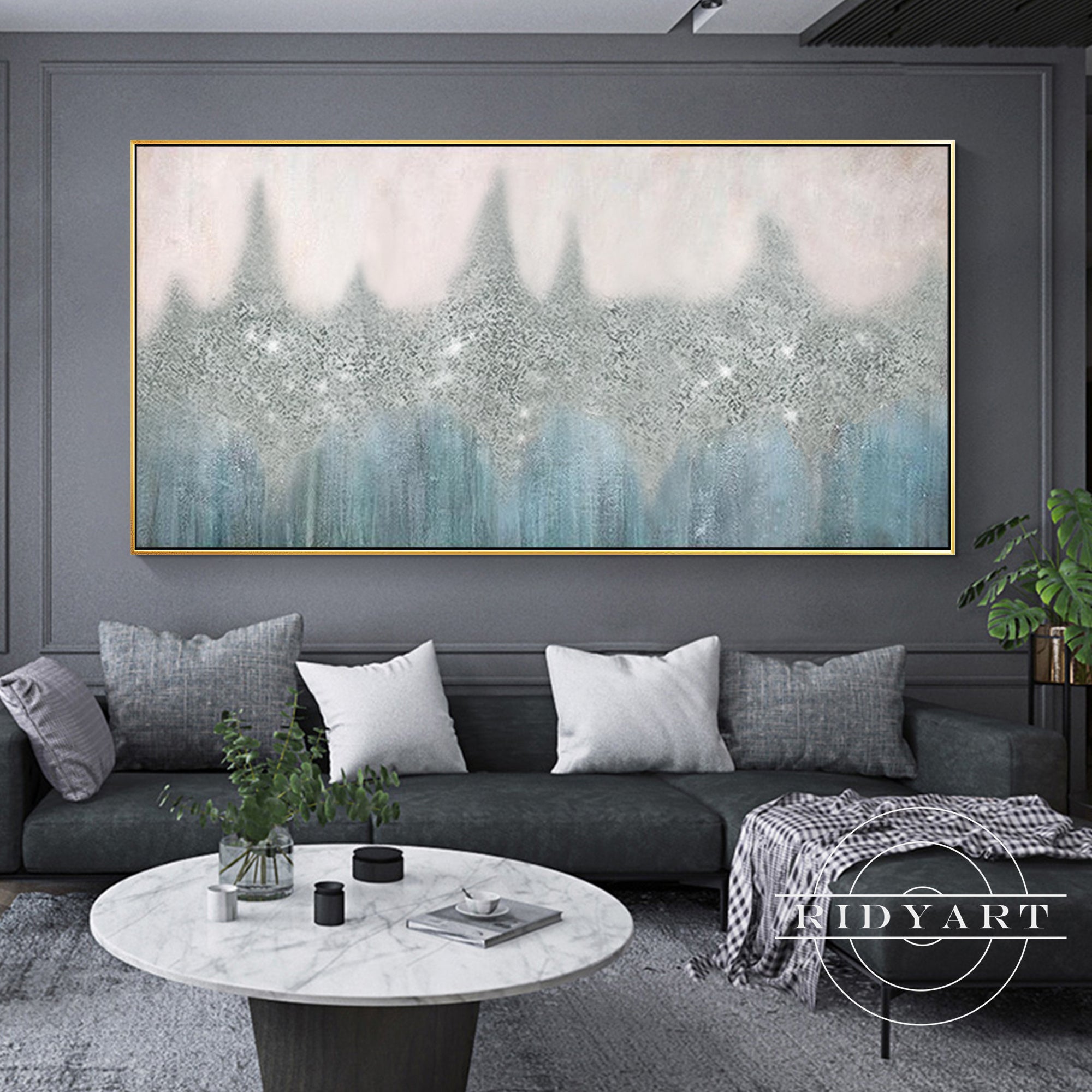 Silver glitter painting with bold blue brushstrokes