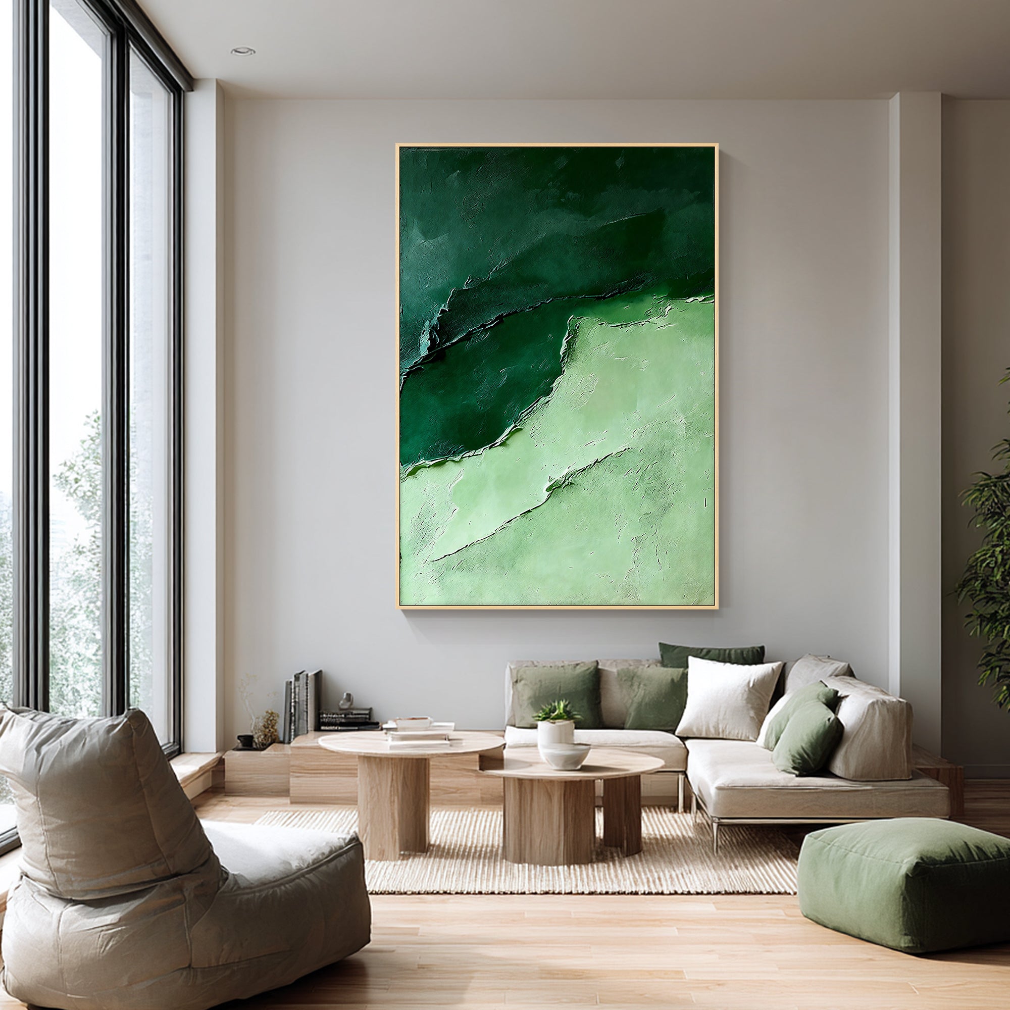 Vertical green canvas painting above minimalist living room seating