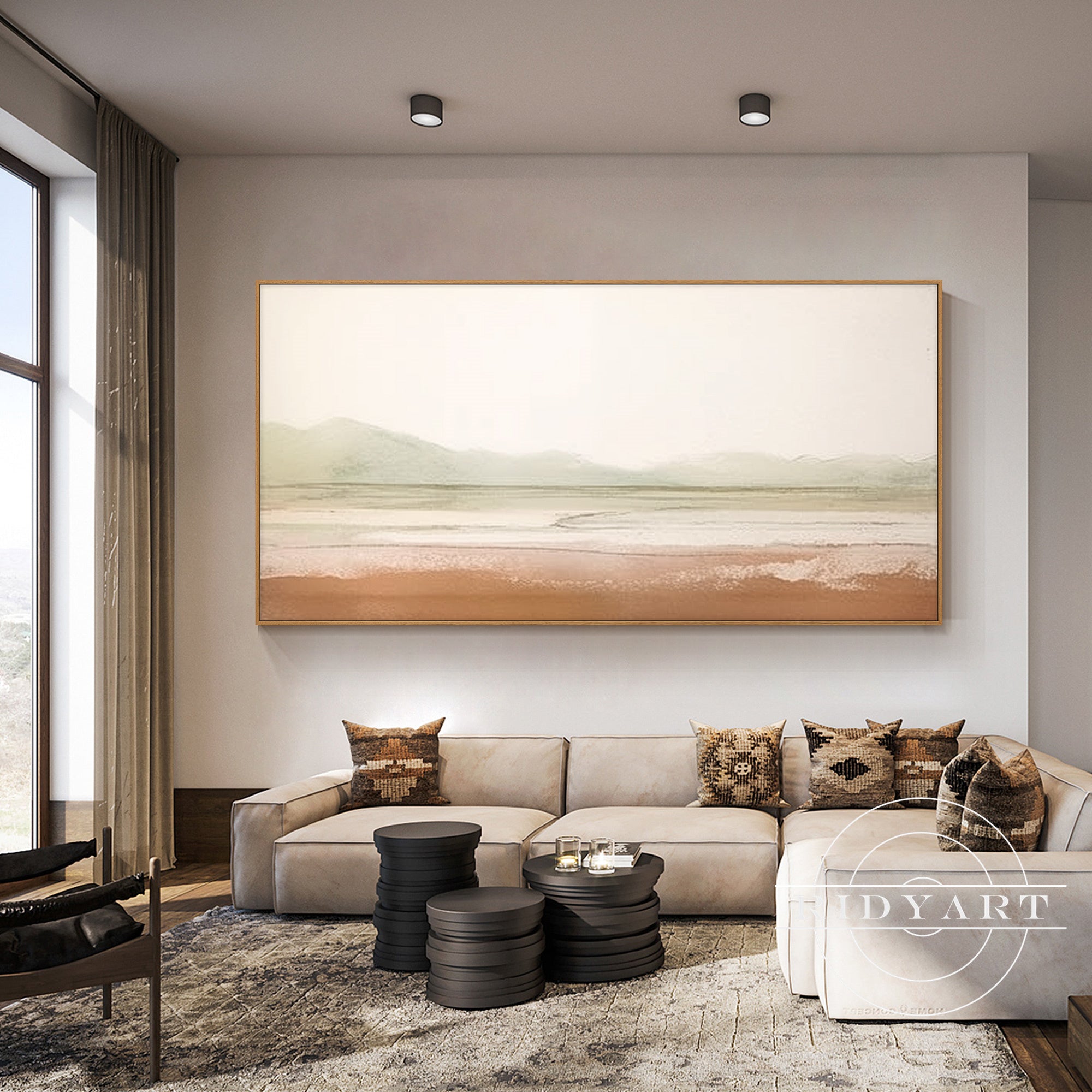 Boho-style framed wall art of abstract mountains in beige tones.