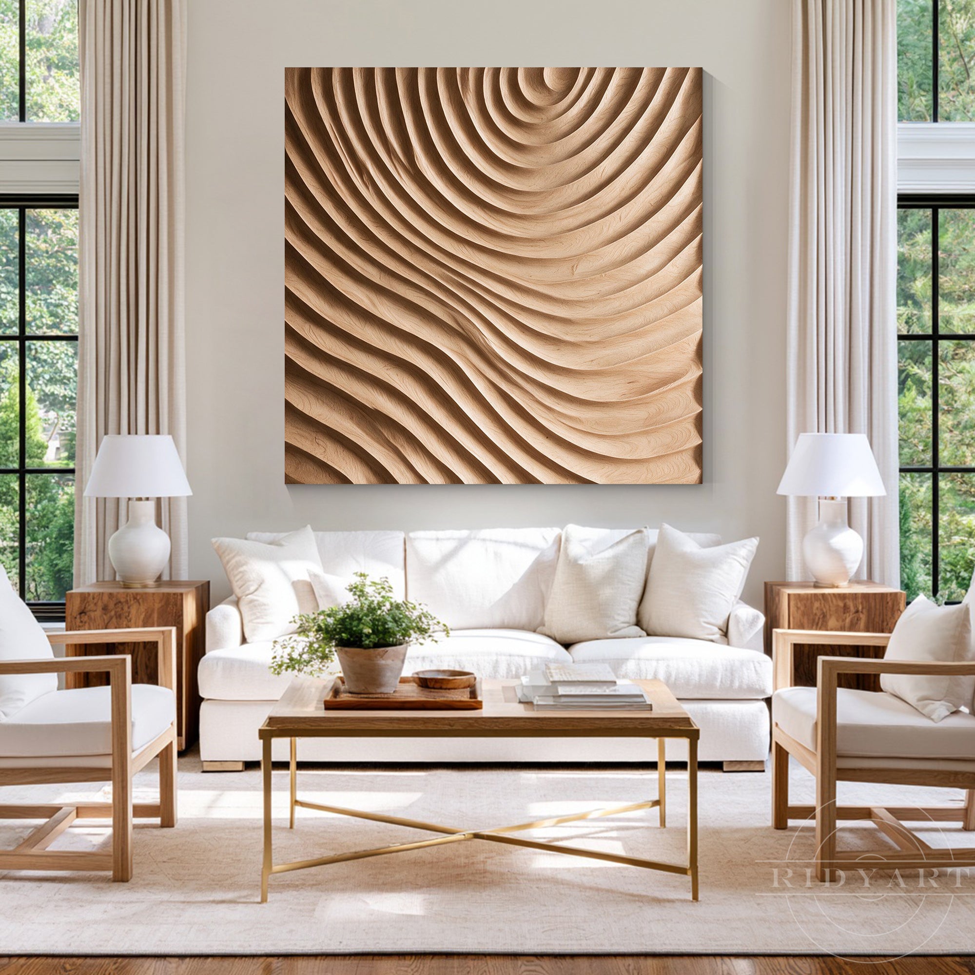 Square swirl and wave wood wall art hanging above a white sofa in a bright modern living room