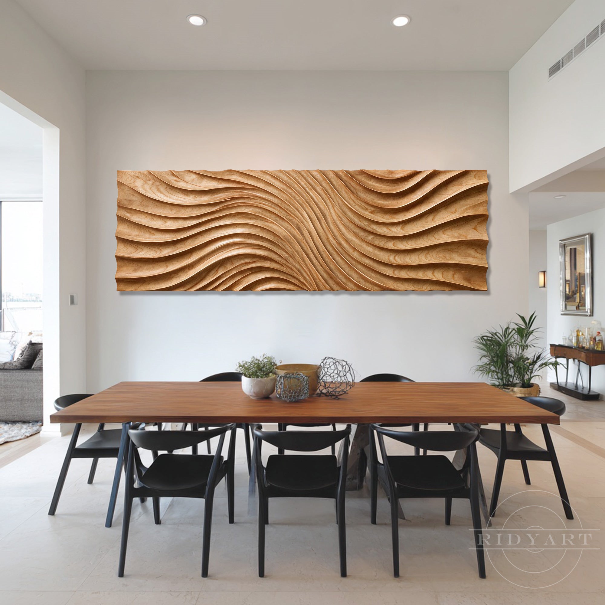 Modern dining room featuring an oversized wood wall art mounted above a large wooden table with black chairs.