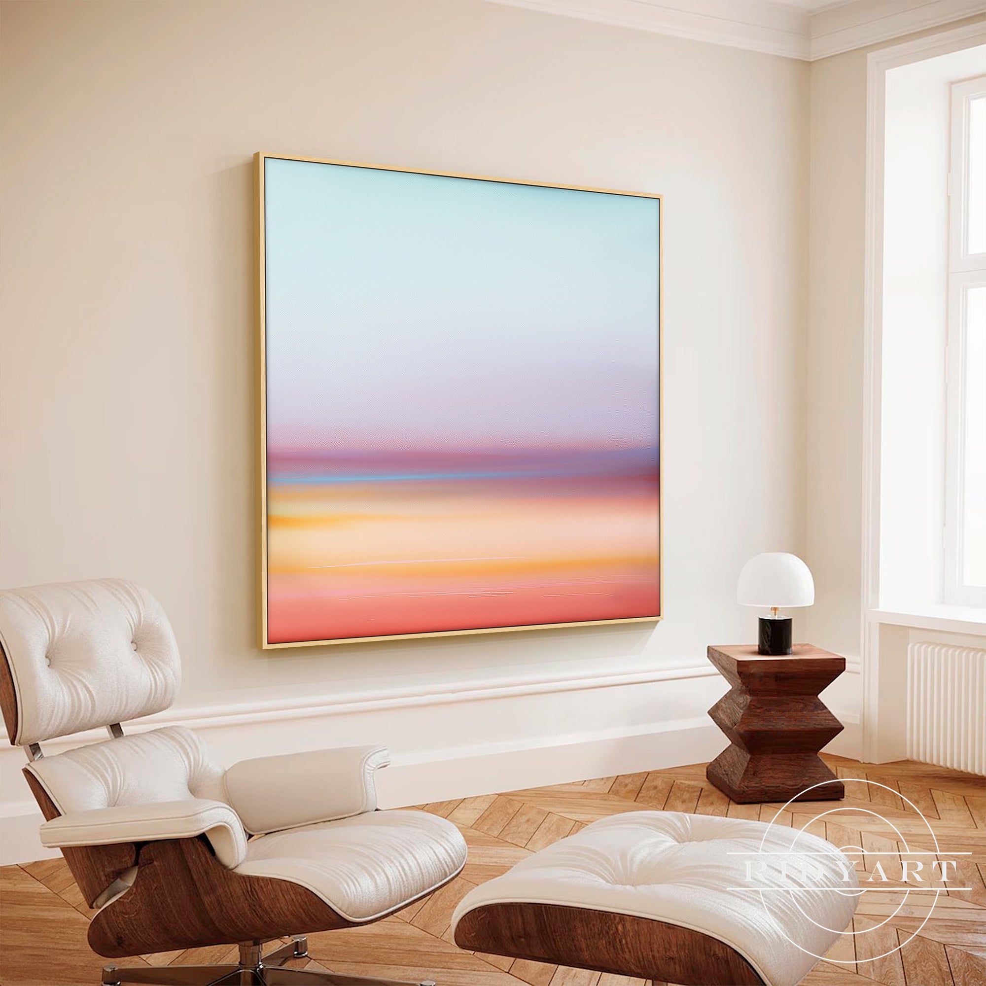 Serene blush pink and lavender abstract landscape art hanging above bed